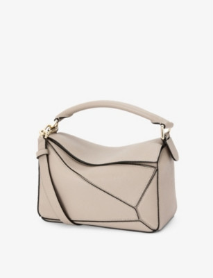 Puzzle small leather shoulder bag | Selfridges