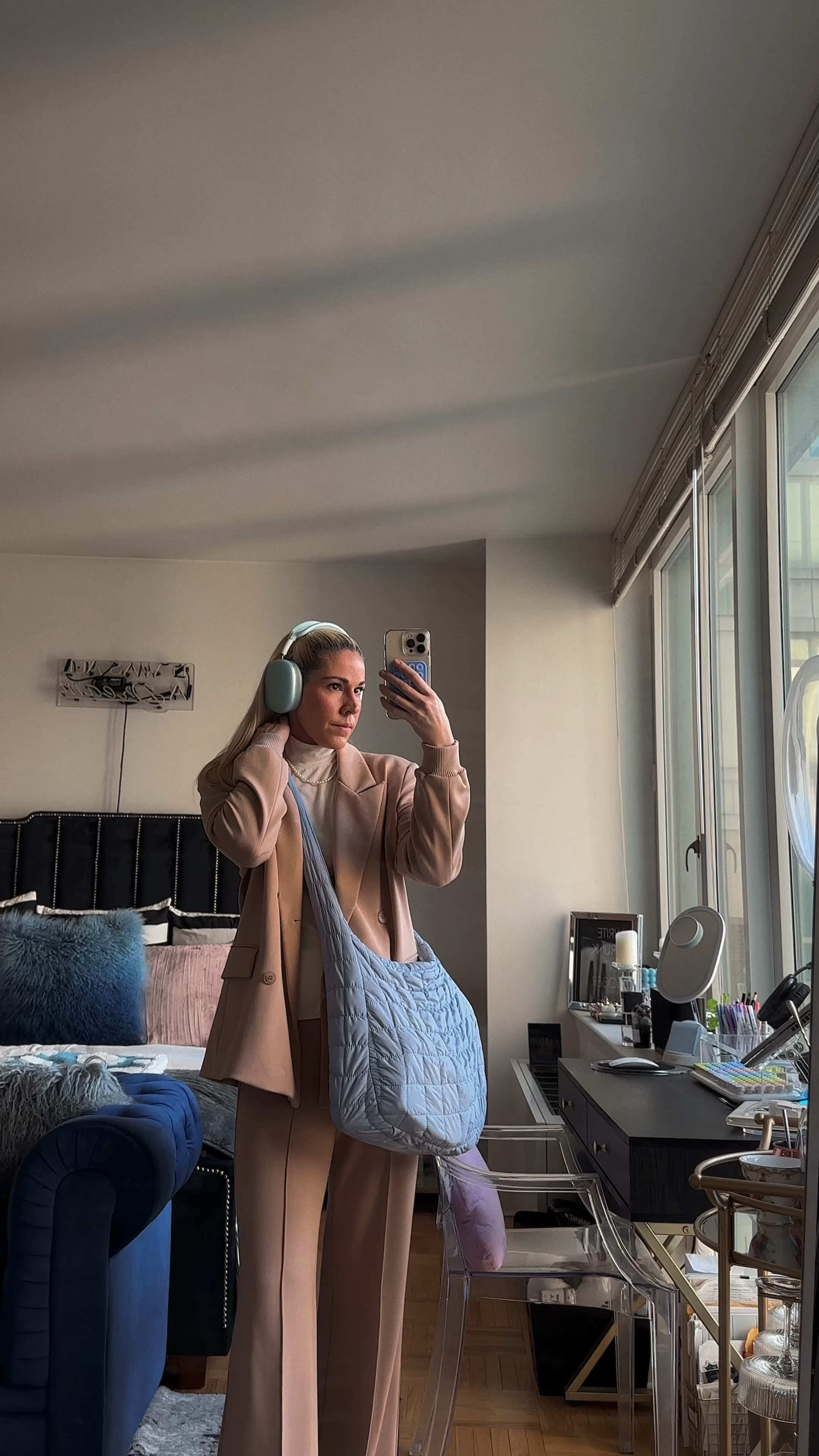 Blue translucent AirPod Max covers, free people quilted bag lookalike, neutral blazer and slacks, cream turtleneck 

#LTKVideo #LTKitbag #LTKworkwear