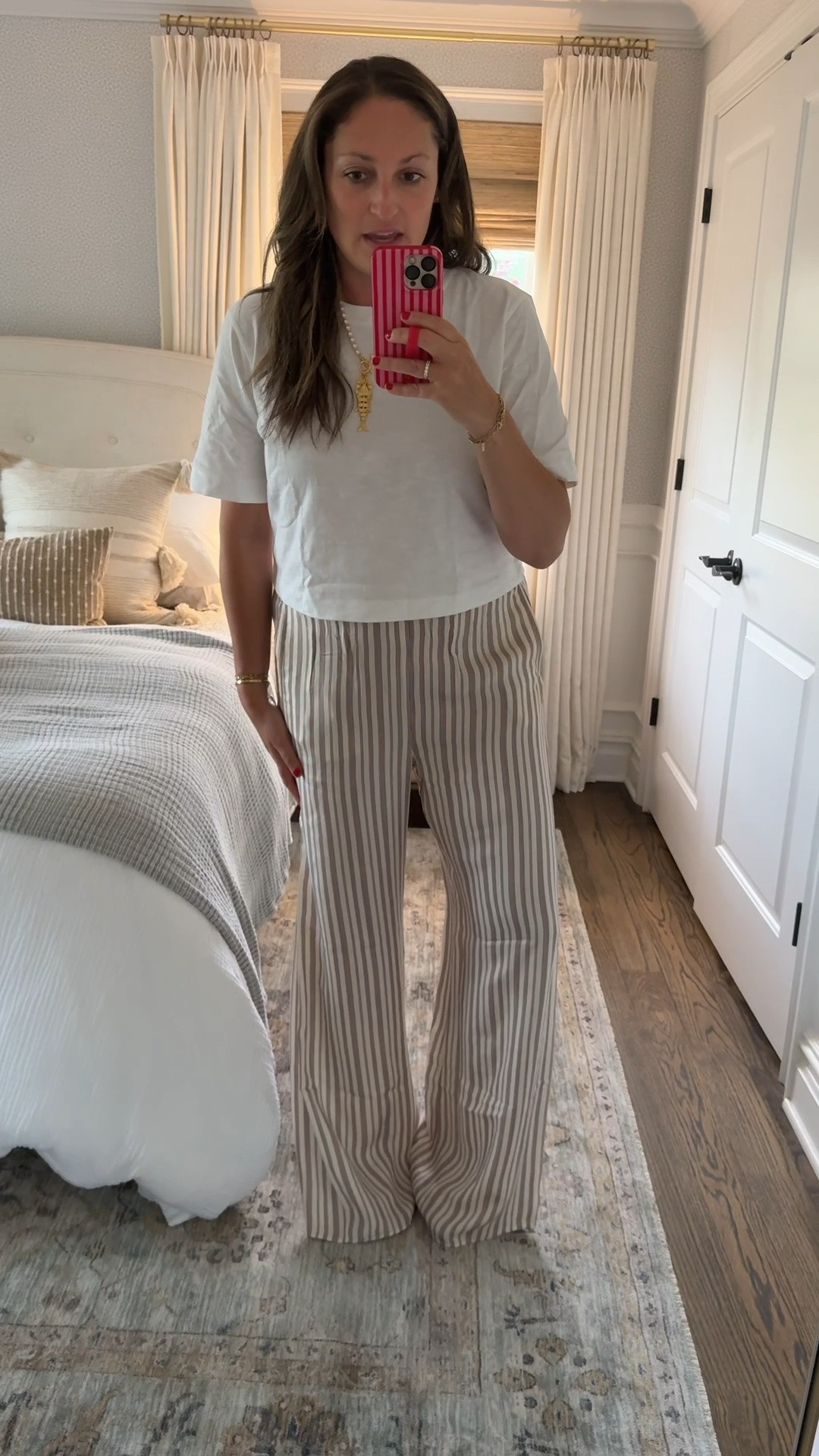 Tonight’s OOTD! Wore these silky pants to dinner and they are so good! On sale, flattering and so comfortable. Also love this summer fish necklace (on sale!!) and perfect white tee 🙌🏻

#LTKootd #LTKSaleAlert #LTKdayinmylife