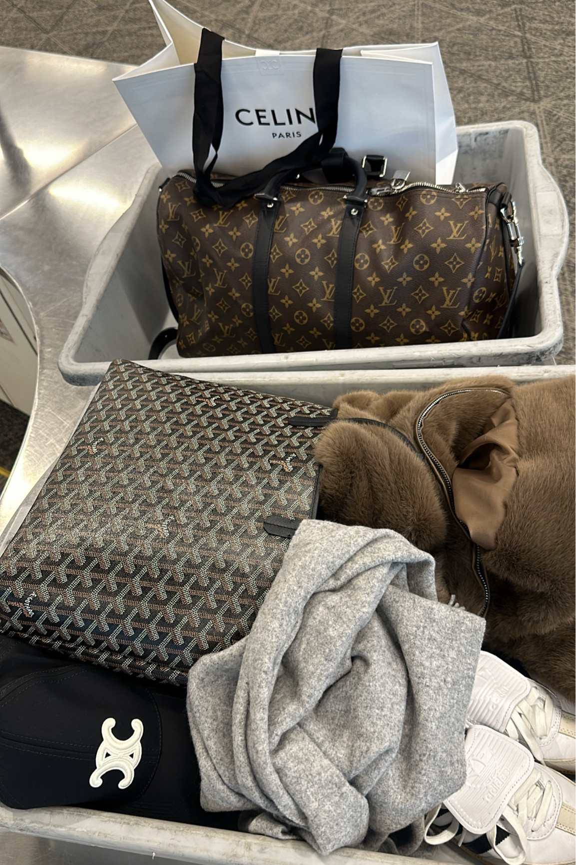 Comfy airport outfit ✈️ 🤍 
Sizing: 
Faux fur jacket- xs 
Sweats- xs 
Zip up sweatshirt- xxs 
T shirt- xs 



Aritzia, aritzia loungewear, airport, travel style, airport look, comfy style, faux fur, Celine, goyard, Ugg, Louis Vuitton 

#LTKTravel #LTKStyleTip #LTKSeasonal