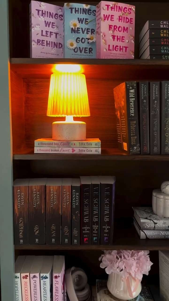 The secret to cozy built-in shelves.I am obsessed with rechargeable light bulbs and I have them all throughout my house. No cords no outlets needed and they make every single space feel so warm and cozy. Once you try them you're going to want them in every room. 

 #LTKHome #LTKU #LTKvlog