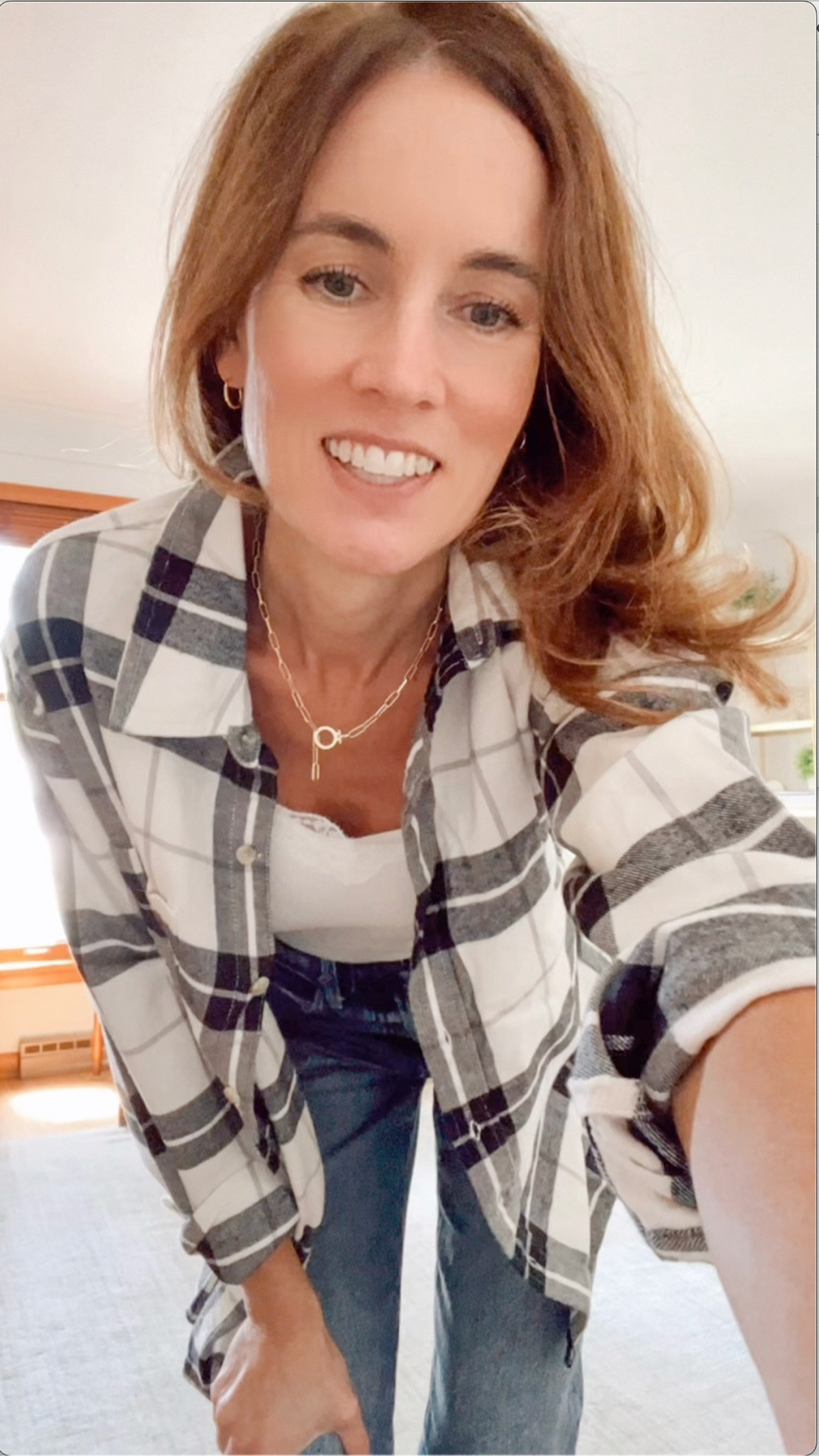 Sharing my "fit" check what I am wearing today - from over 50 year old - perfect for a cooler late summer/fall day:  
Lace trim tank top from Old Navy for only $7 (wearing XS - TTS)
Black and white flannel plaid shirt from American Eagle on sale for $15 (wearing XS - TTS)
Dark wash straight/barrel jeans from Pistola - favorite for 2 years
My favorite gold necklace from Gorjana
#gorjana #oldnavy #over50style #under25 #fitcheck

#LTKStyleTip #LTKOver40 #LTKFindsUnder50