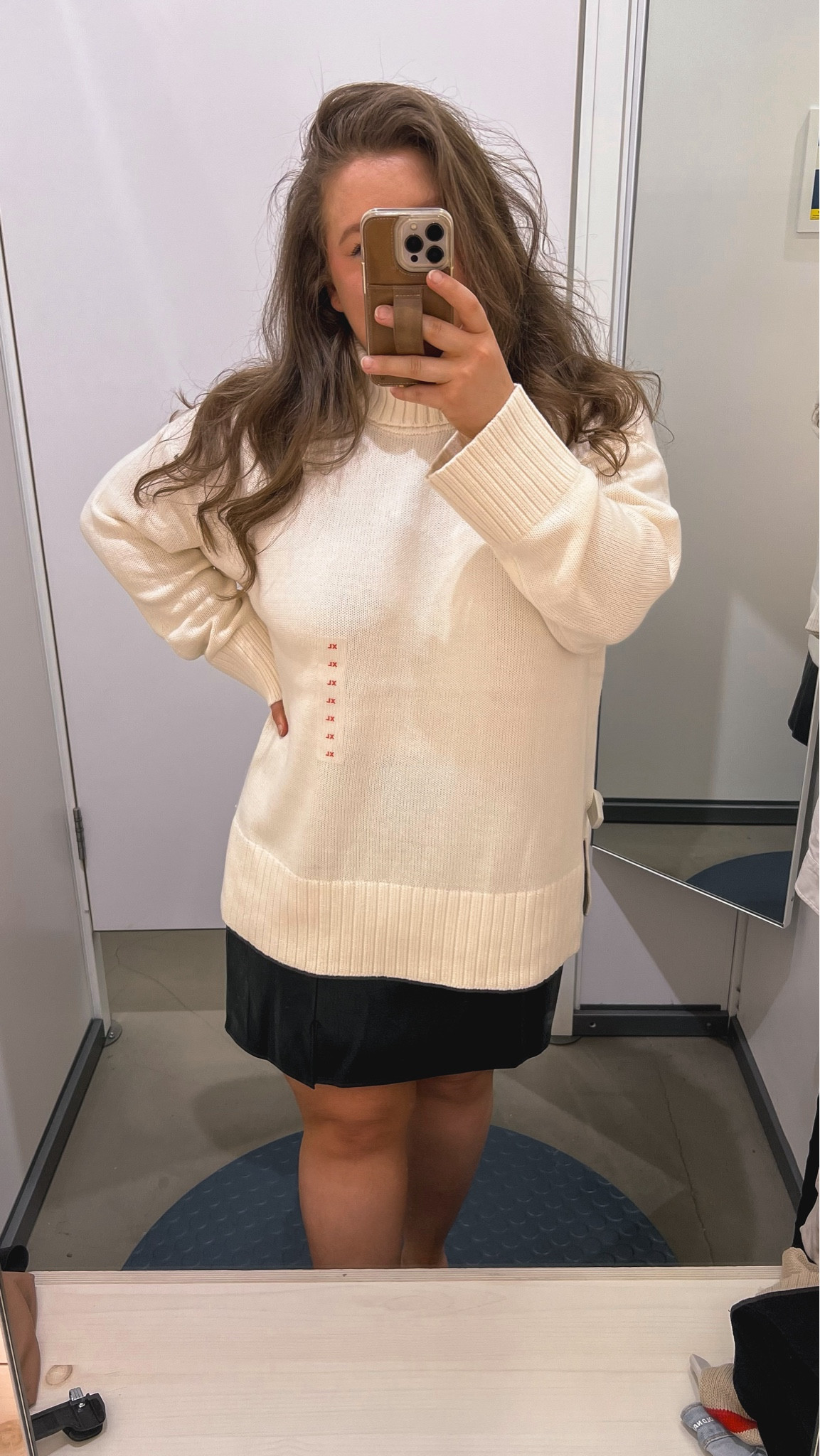 Old Navy is having an insane sale right now!! This cream turtleneck sweater goes with literally everything - including this black faux leather mini skirt! 

#LTKFindsUnder50 #LTKSaleAlert #LTKMidsize