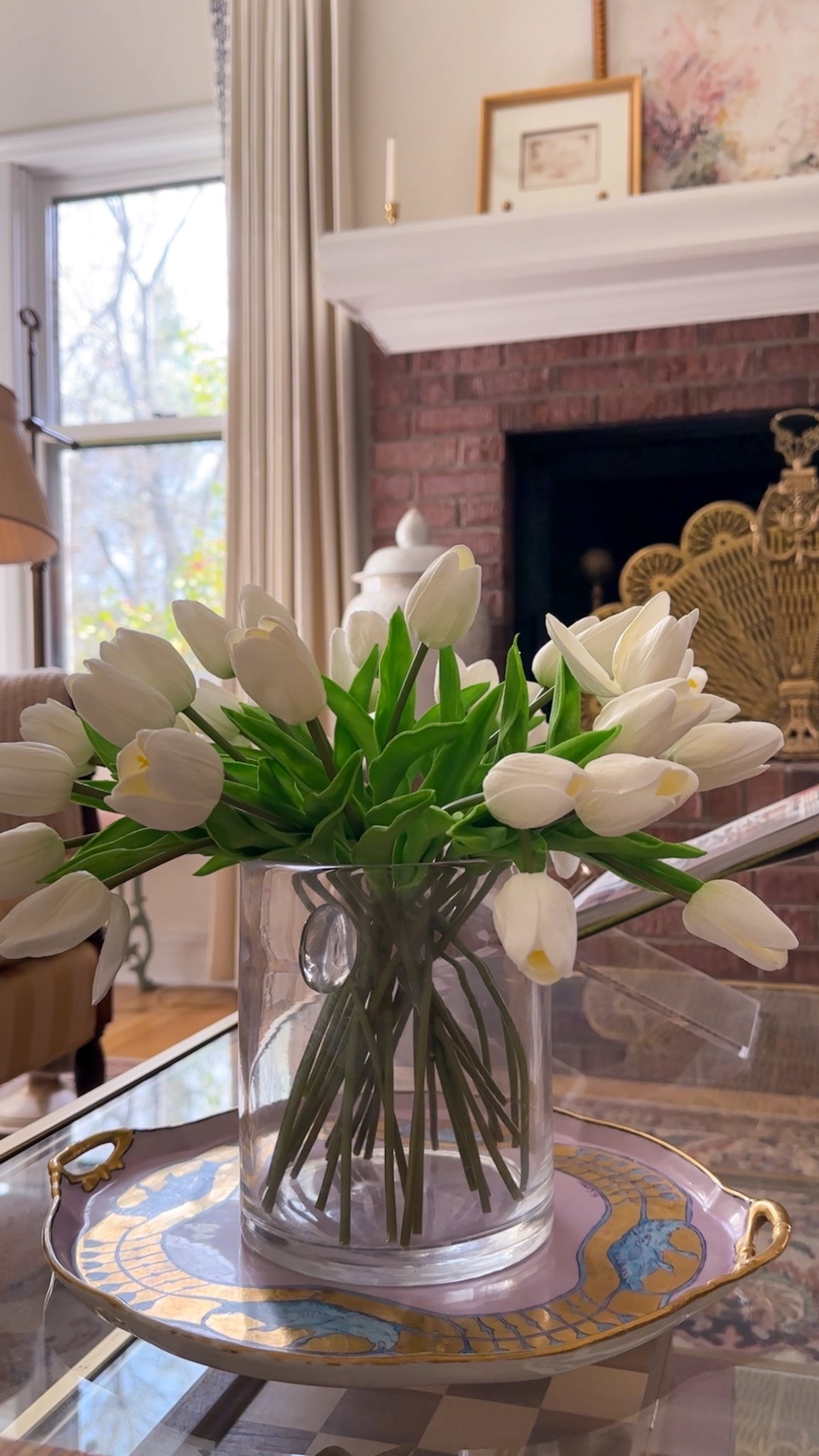 Obsessed with these tulips that are so lifelike! I have 30 styled in the small nodo vase. Everything tagged here. #spring #springdecor #homedecor #coffeetable 

#LTKHome #LTKspringtrends #LTKSeasonal