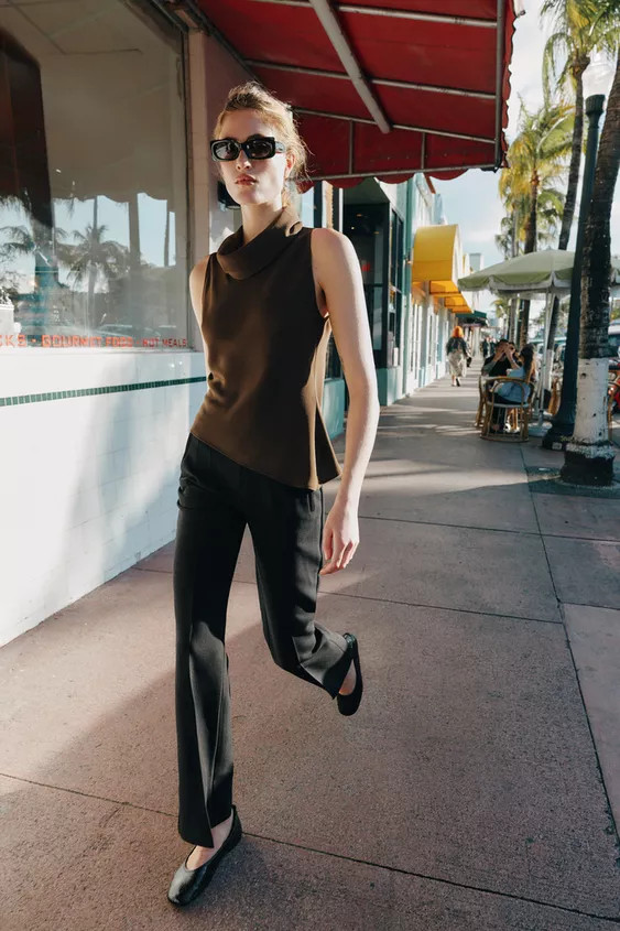 Flowy neck and sleeveless top. Asymmetric hem. | Zara US