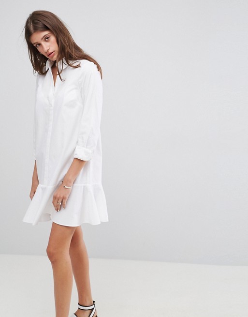 ASOS DESIGN - Robe chemise courte à basque | ASOS FR