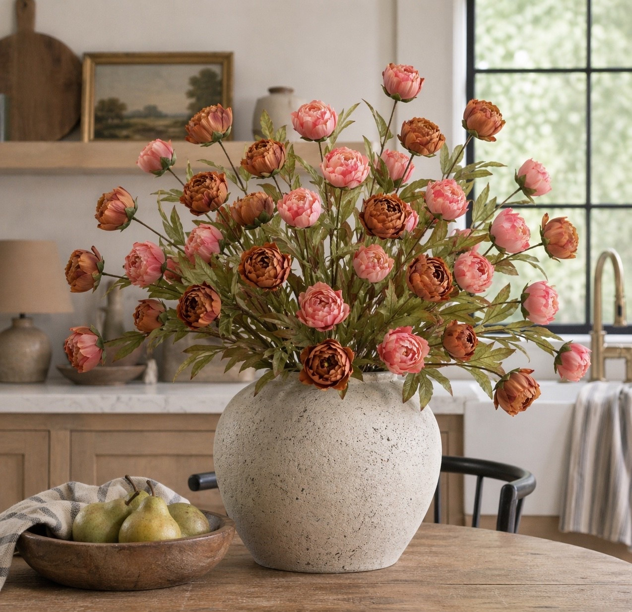 Two colors = one stunning custom look. I mixed the newly released brown + coral Ashland peony stems from Michaels for the prettiest warm designer-inspired arrangement. The moody brown adds depth while the coral keeps it soft and feminine… together they look like something from a high-end boutique.

I love combining both shades in a large textured vase for a fuller custom arrangement on a kitchen table, island, entryway console, or dining space. This mix pairs beautifully with wood tones, brass, creams, olive, and cozy fall textures.

Such an easy way to create that styled, collected home look without spending florist prices. Michaels floral colors that look this good never last long. Linked in my LTK.#MichaelsFinds #AshlandDecor #PeonyStems #FallDecor #NeutralDecor #StudioMcGeeStyle #HearthAndHandStyle #TrendyHomeDecorFinds

#LTKHome #LTKSeasonal #LTKHome #LTKSaleAlert #LTKSeasonal