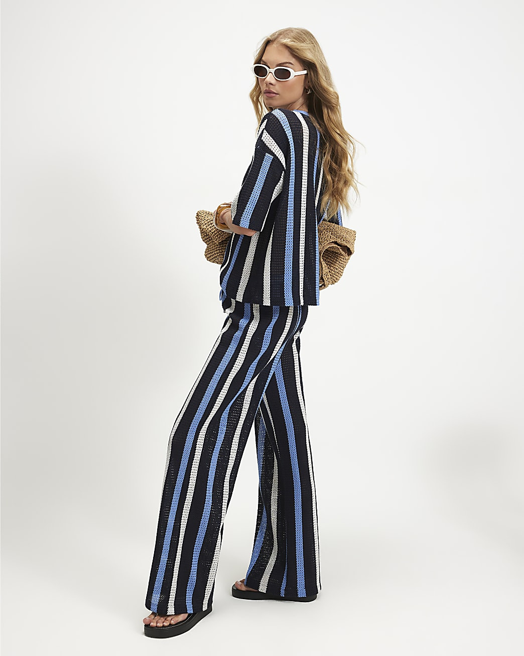 Navy Crochet Stripe Trousers | River Island UK & IE