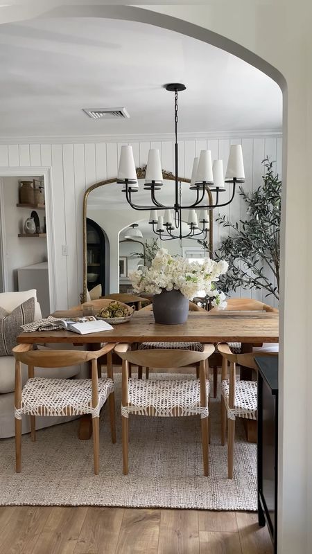 Dining room, dining table, dining chairs, neutral home decor, faux trees, faux florals, vases, accent chairs, floor mirror, dining room lighting, chandelier  

#LTKHome #LTKStyleTip