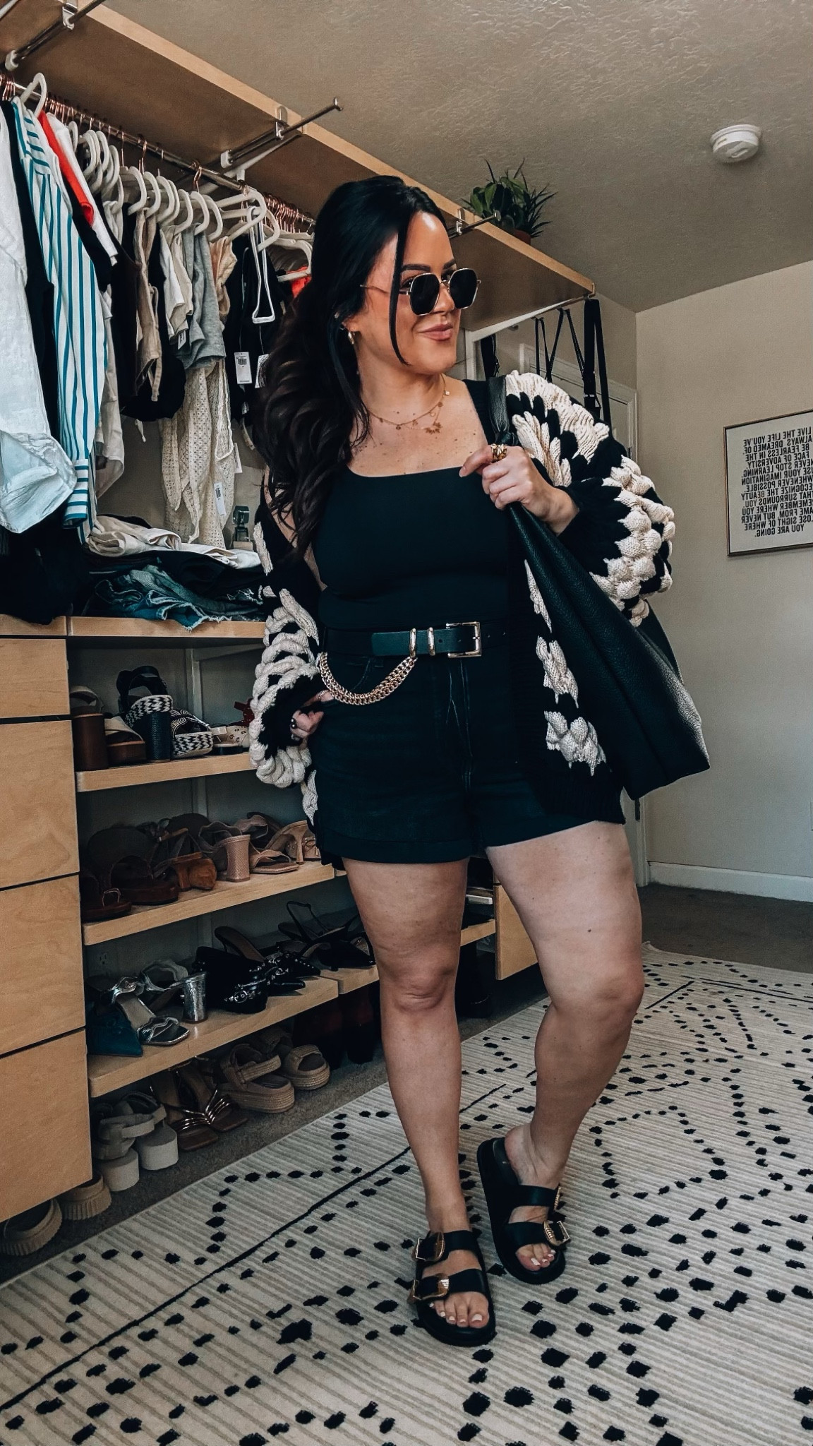 Midsize spring outfit Inspo 
Stretch black denim shorts ( sized up one to a 16) 
Cropped tank large 
Chunky Amazon cardigan xl 
Buckle slide sandals tts 
Bucket back 
Comfy T shirt bra tts 

#LTKSeasonal #LTKstyletip #LTKmidsize