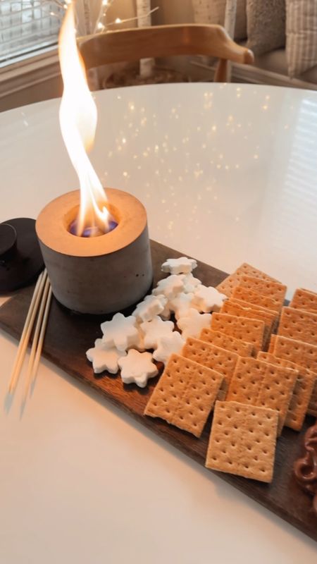 Celebrate Christmas with this fun indoor s’mores board with alcohol fire pit 

#LTKfamily #LTKHoliday #LTKhome