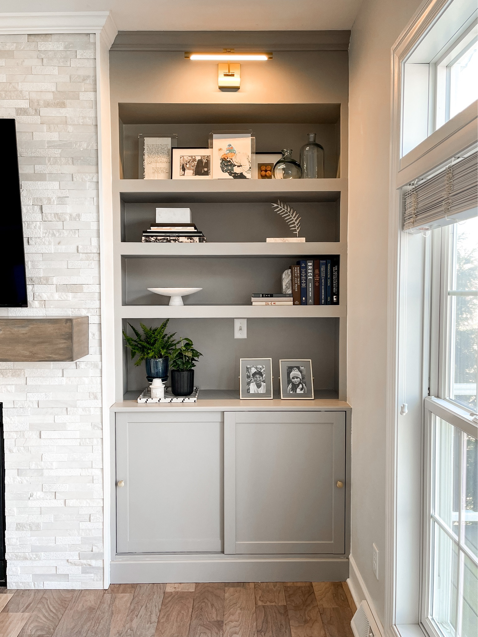 This brass picture light is on major sale - $242, down from $419!! RUN! 🏃‍♀️

Wayfair sale, living room decor, shelf decor, picture light, Target decor, living room built ins, living room fireplace and built ins, marble tile 

#LTKsalealert #LTKFind #LTKhome