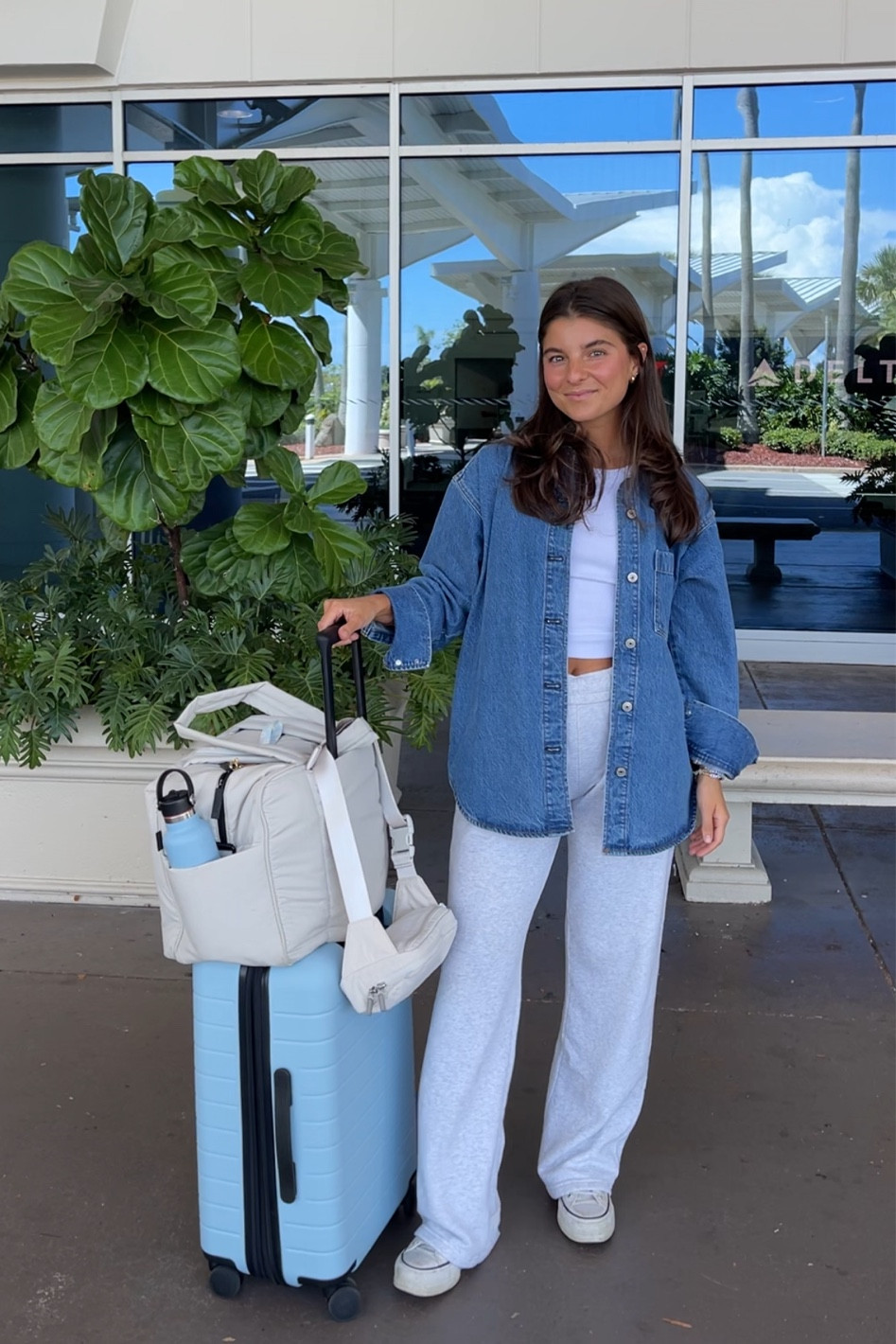 airport outfit 🫶🏼 CODE AFLTK for 20% off 
xs in denim shirt (it’s oversized!) 
XS in sweats- I’m 5’2 and they’re a tad bit long, can roll up 
XS in tank - favorite basic

#LTKSale #LTKfindsunder100 #LTKsalealert