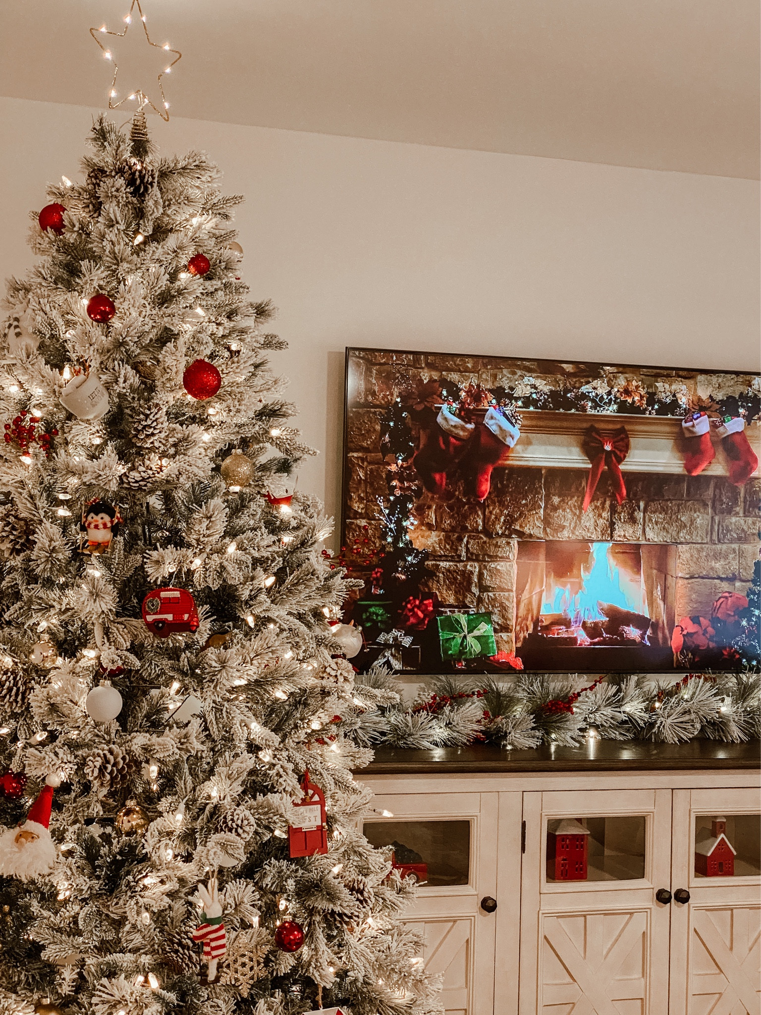 Christmas Tree Decor 🎄 I love our Christmas decor set up from last year! This beautiful flocked tree is available again this year at Lowes. I’ve linked a few of the ornaments as the garland. 

#LTKhome #LTKHoliday #LTKSeasonal