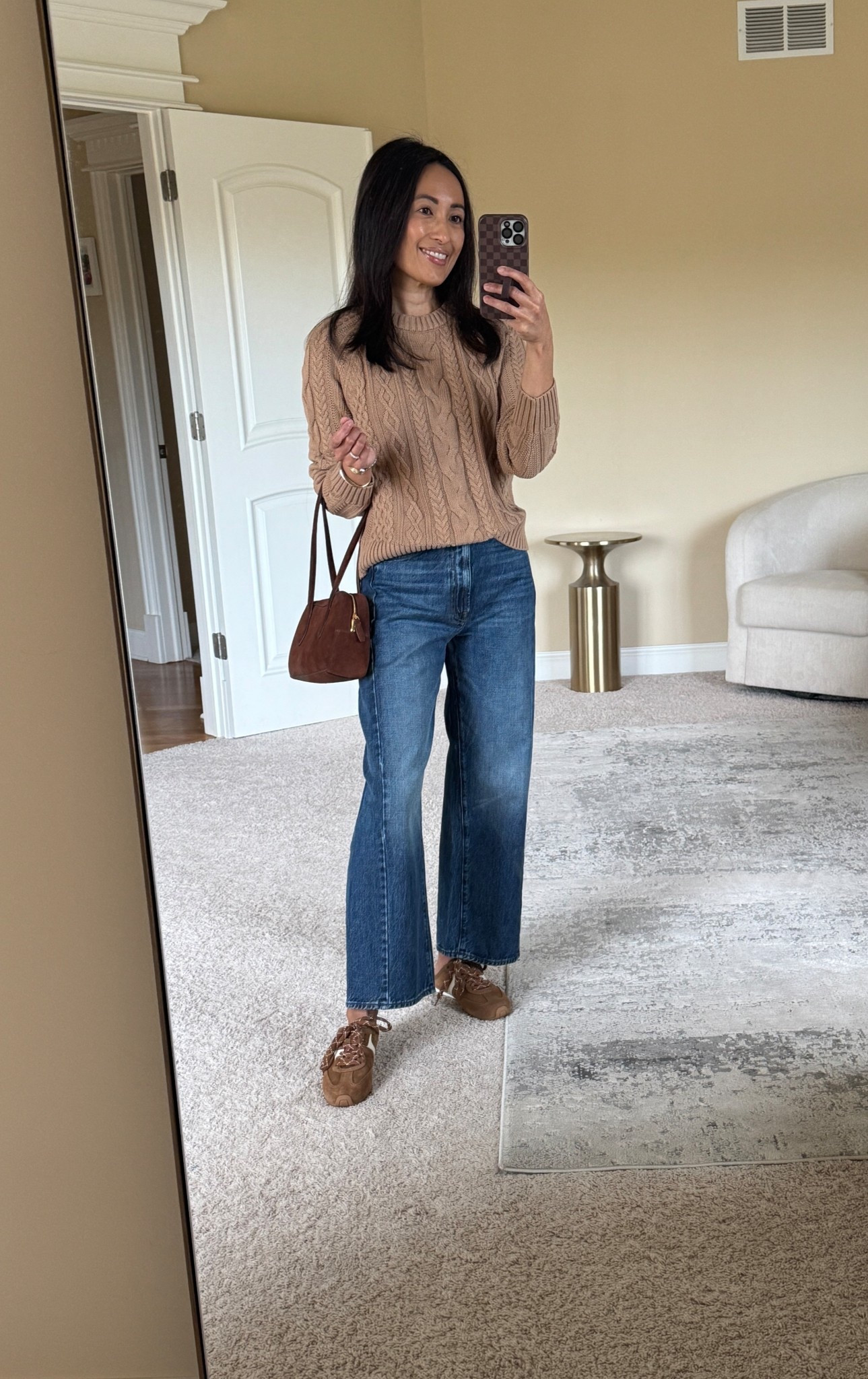 Fall outfit. Cable knit sweater is a closet staple  
Cotton cable knit sweater is from last year and linking 3 similar options that I have seen and like in person. Size up for a comfy fit. 
Barrel jeans. 
Suede sneakers. Brown sneakers. 
Suede bag. Suede handbag  

#LTKOver40 #LTKShoeCrush #LTKItBag