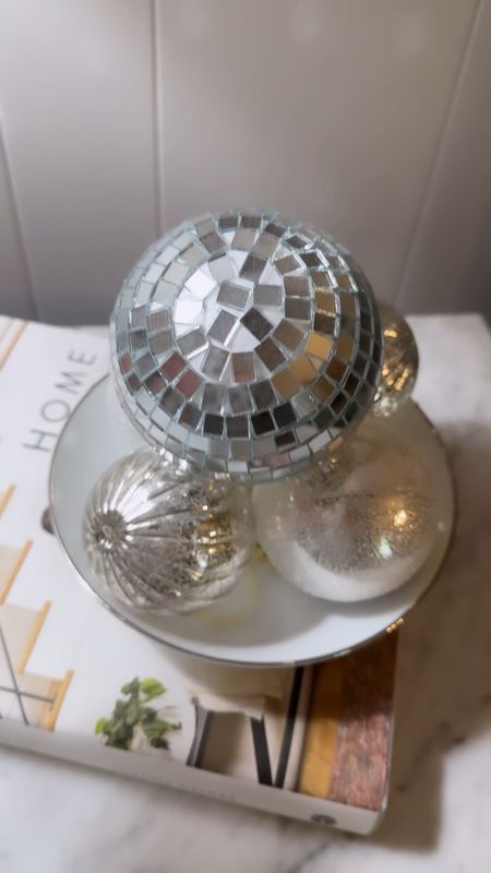 I just love adding disco balls 🪩 for instant decor! I’ve added a disco ball to this simple bowl of neutral ornaments for a pop of whimsy!

In the morning and the evening when the sun hits it just right, it’s an instant sparkle 💖 party! ✨ 

#LTKfindsunder50 #LTKhome #LTKstyletip