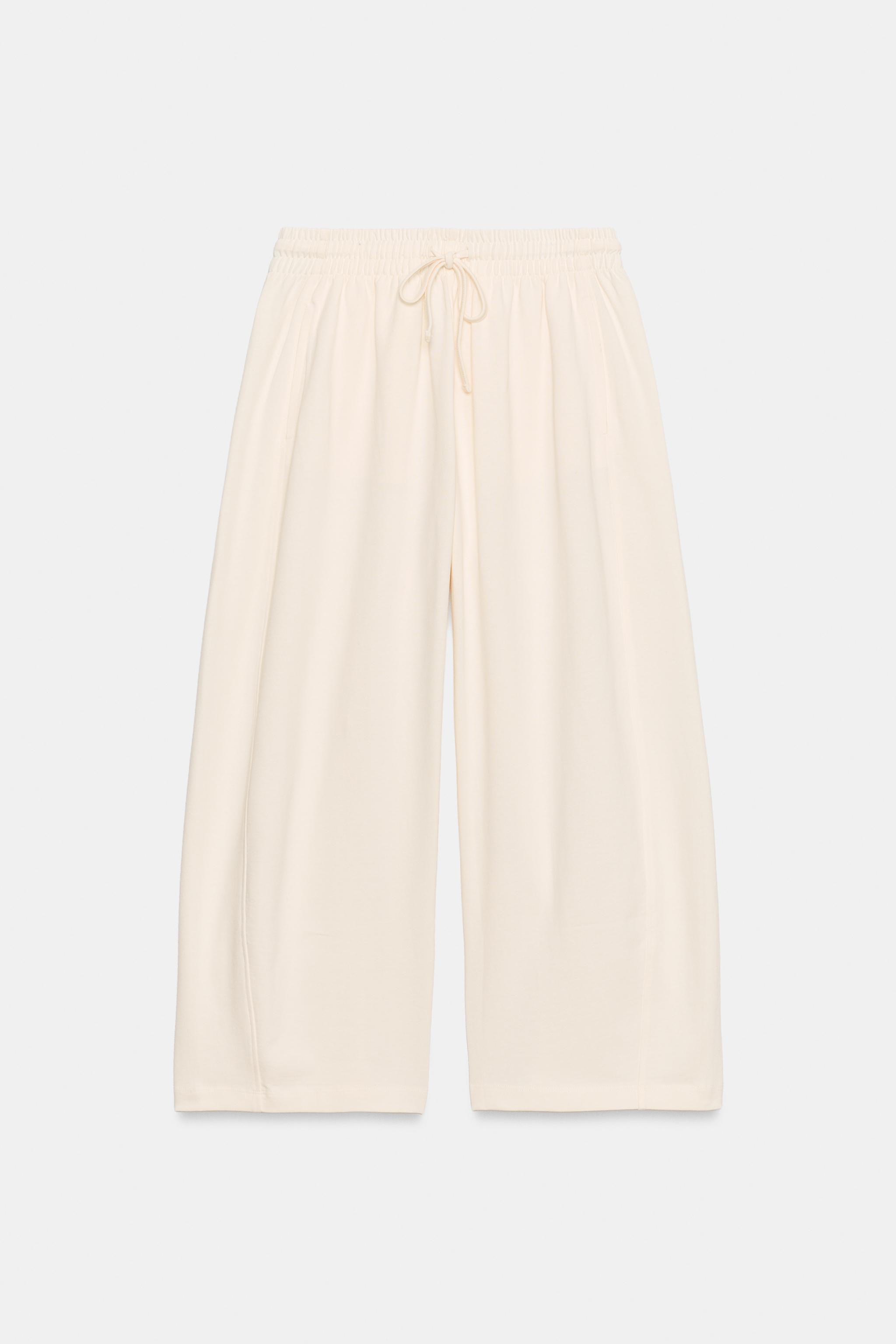 Trousers made from spun cotton fabric. Featuring a mid-waist, adjustable elasticated drawstring w... | Zara UK