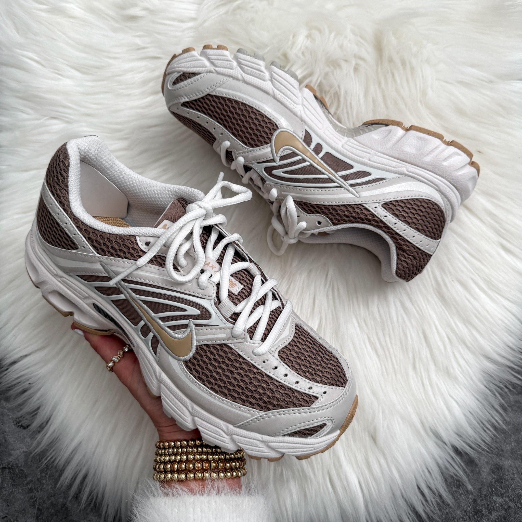 Woman’s Nike Air Max Moto 2K Sneakers. Runs true to size. Comes in over 10 colors. 