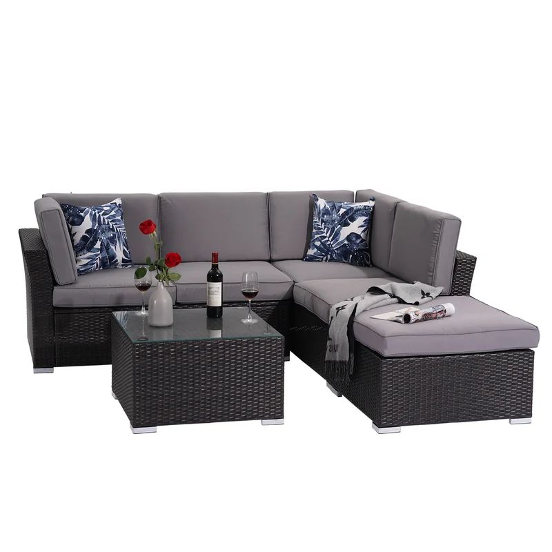 Emanuelis 4 Piece Rattan Sectional Seating Group with Cushions | Wayfair Professional