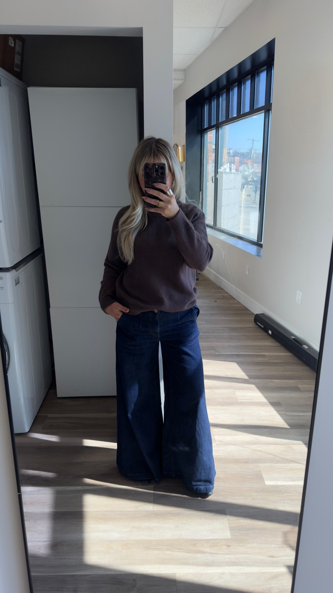 My fave low rise wide leg jeans from American Eagle in dark denim size 6 
Brown sweater size small 
Black boots size 7 