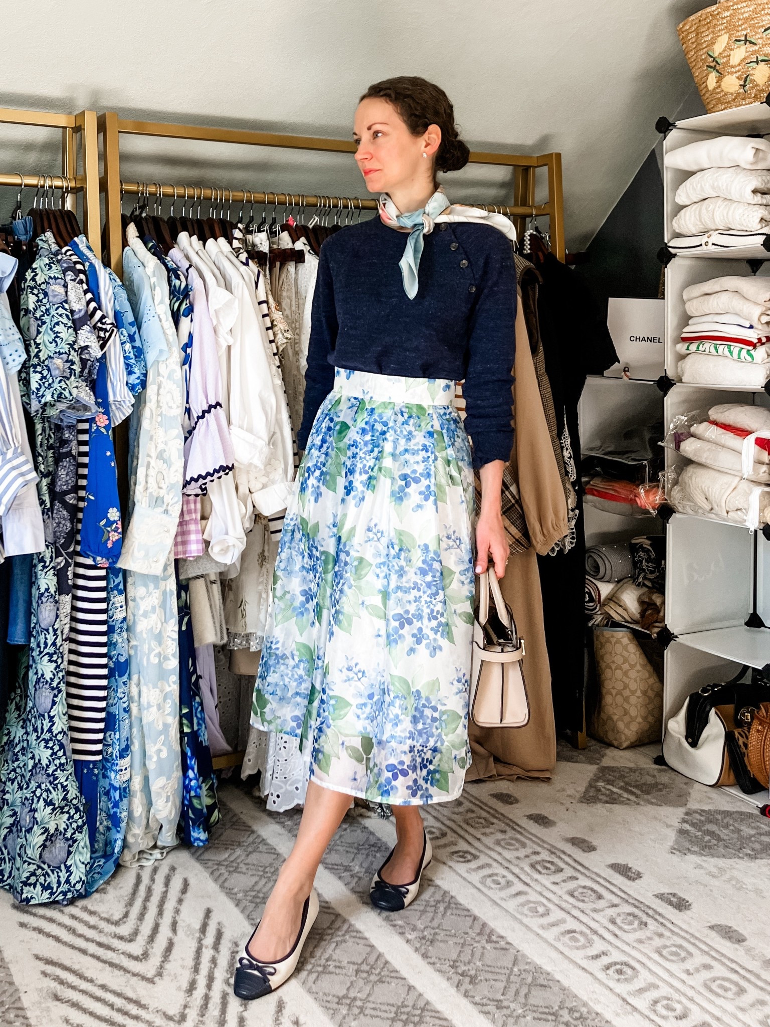 A blue and white spring outfit!
Sweater is old from Abercrombie, linking similar. 
Hydrangea print skirt from Chicwish. 
Silk scarf is vintage, linking similar. 
Diamond stud earrings from Amazon. 
Leather handbag from Le Tanneur. 
Ballet flats are old from Nine West, linking similar. 
Petite outfit. Modest outfit. Vacation outfit. Classic outfit. Feminine outfit  

#LTKdayinmylife #LTKmomlife #LTKootd