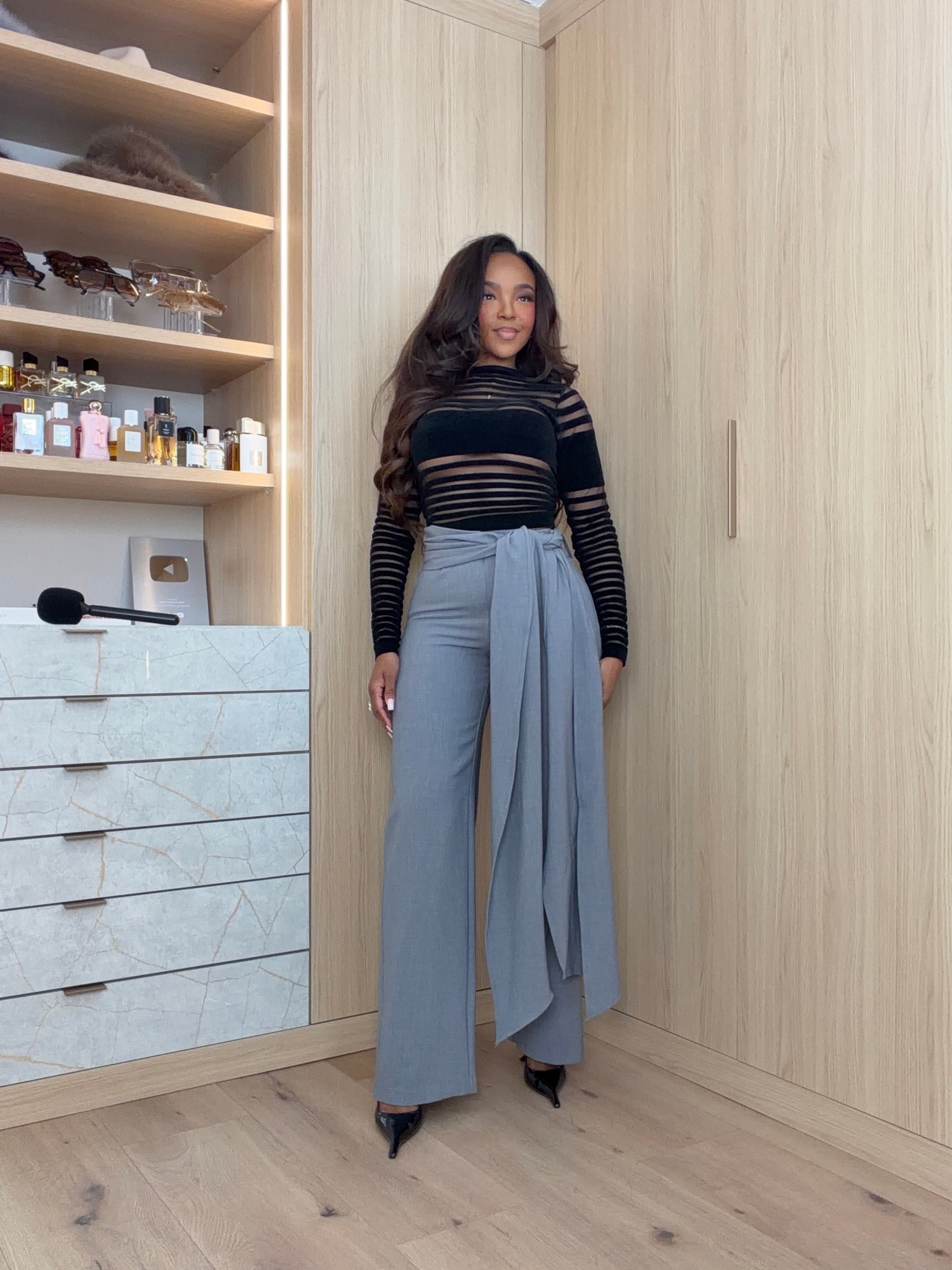 Sheer sophistication meets modern chic! 🖤✨

This black sheer striped long sleeve top paired with tailored gray wide-leg trousers is the perfect mix of edgy and elegant! The fitted silhouette, dramatic draped waist detail, and sleek pointed-toe heels create a sophisticated statement look. Perfect for date nights, dinner parties, girls' night out, or elevated fall fashion!

Everything is linked below! 🛍️

sheer black top outfit, black mesh long sleeve top, striped sheer top, gray wide leg trousers, draped waist pants, chic date night outfits, elevated going out outfits, sophisticated fall fashion, classy dinner outfits, trendy women's fashion, statement trousers, elegant evening outfits, modern minimalist style, fall outfit inspiration, edgy chic outfits