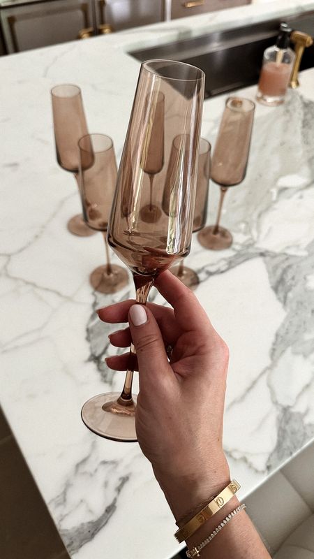 Estelle colored glasses, champagne glasses in amber smoke. These are my favorite glasses and I have a few other styles as well  

#LTKstyletip #LTKhome