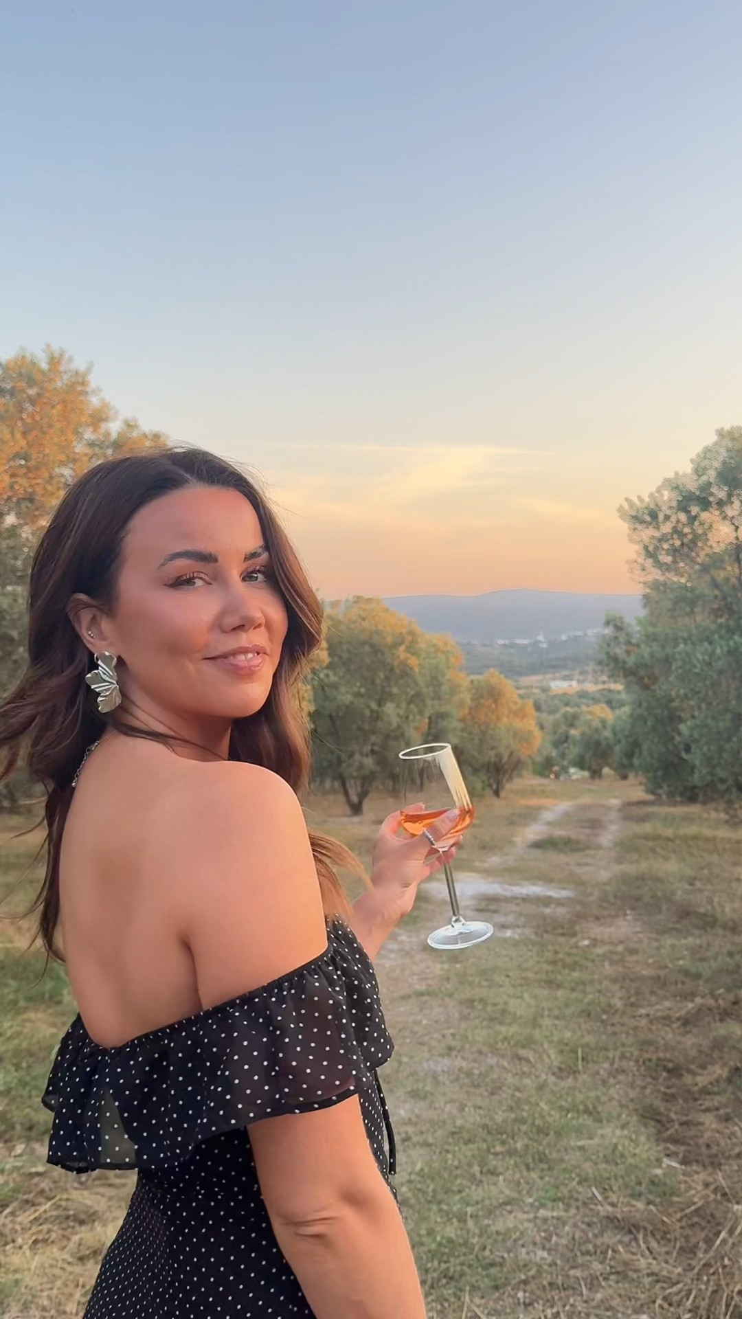 Gorgeous summer evening on a euro summer trip, in a vineyard wearing off shoulder polka dot maxi dress from Peppermayo with statement earrings 

#LTKuk #LTKeurope #LTKsummer