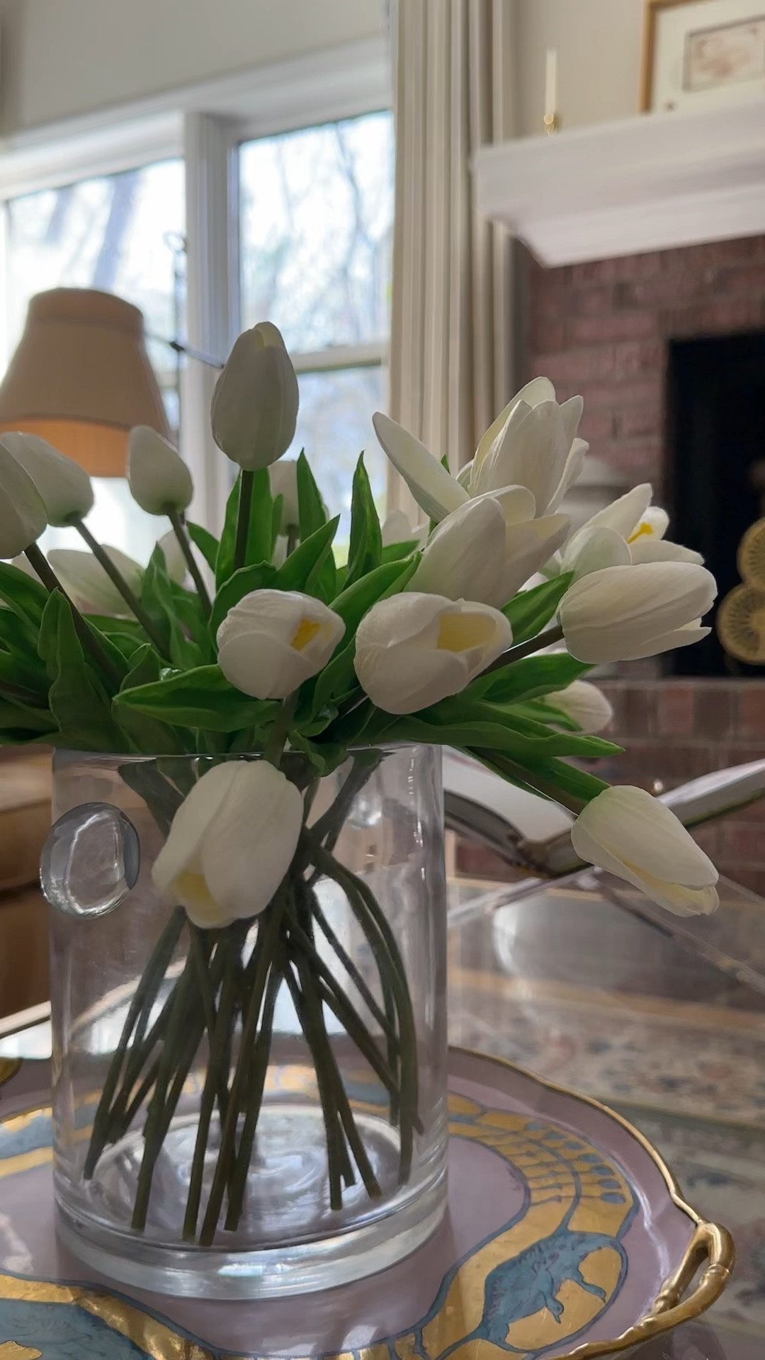 Obsessed with these tulips that are so lifelike! I have 30 styled in the small nodo vase. Everything tagged here. #spring #springdecor #homedecor #coffeetable 

#LTKSeasonal #LTKHome #LTKspringtrends
