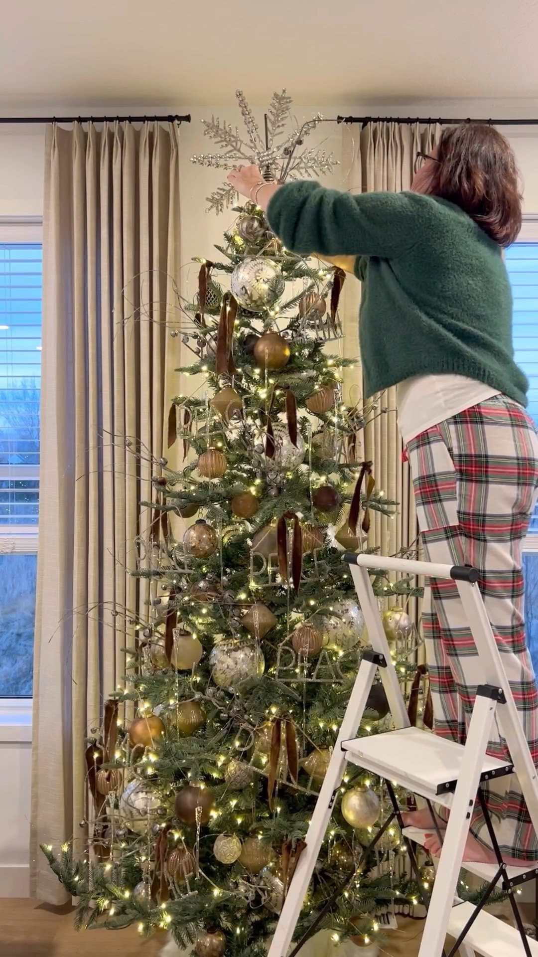 My Christmas tree is dressed and ready to party! I used ball ornaments in browns and grays and large Mercury, icicles, a peace sign (no longer avail), brown velvet ribbon, and a glittered bell spray. Plus a gorgeous star topper  

#LTKCyberWeek #LTKhome #LTKHoliday