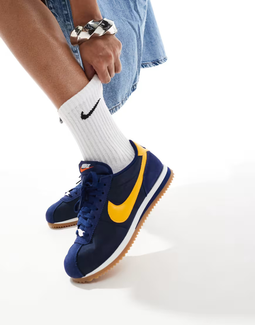 Nike Cortez sneakers in navy and yellow | ASOS (Global)