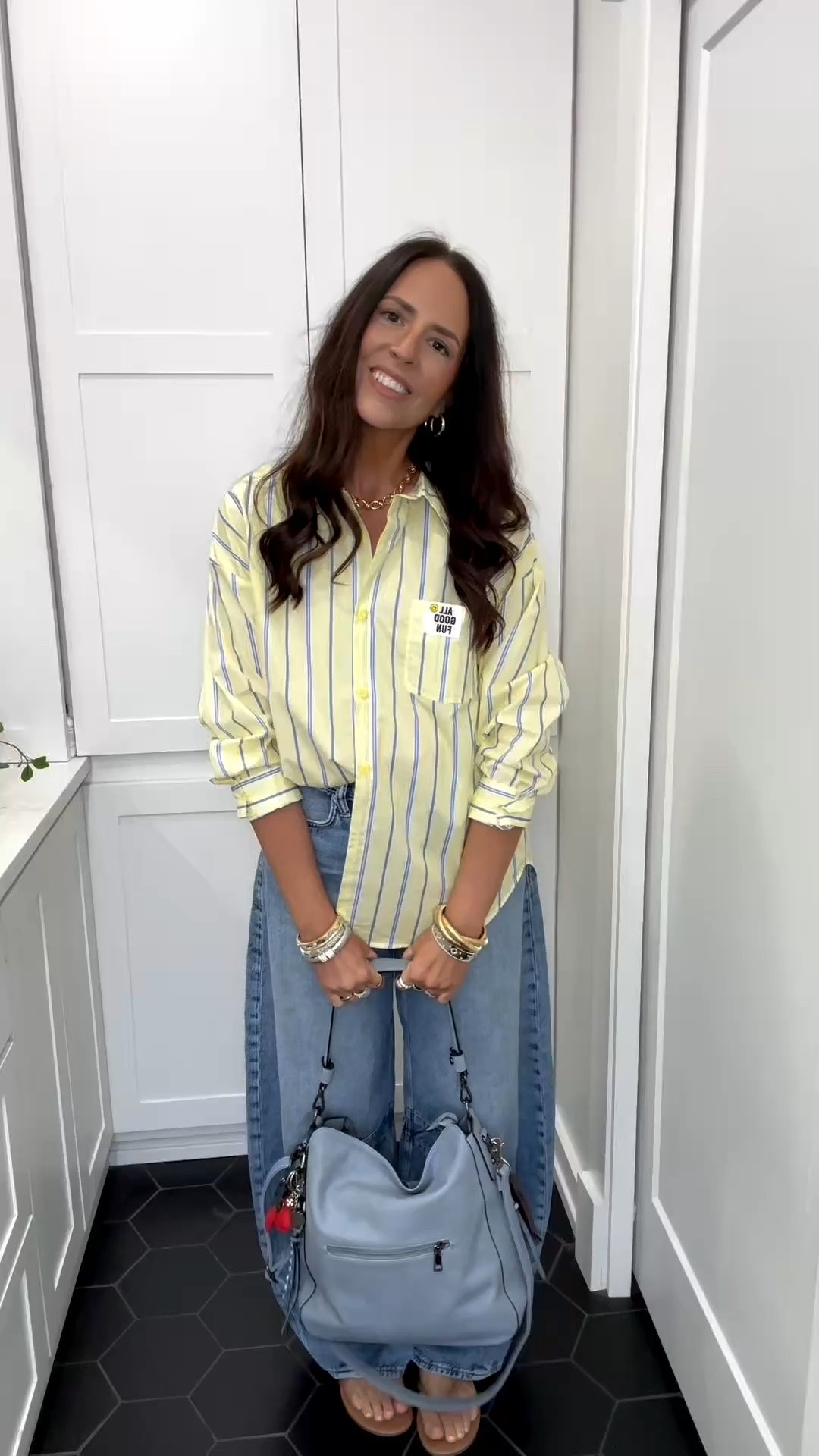 Shirt: s/m runs oversized 
Jeans: 6 tall TTS
Shoes: 9 (size 8.5 for reference) 