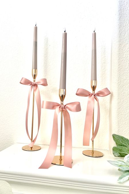 Battery operated candle sticks 
Kid friendly candles 
Gold candle holders 
Satin ribbon 
Pink bows 
#justaddabow

#LTKhome #LTKMostLoved #LTKstyletip