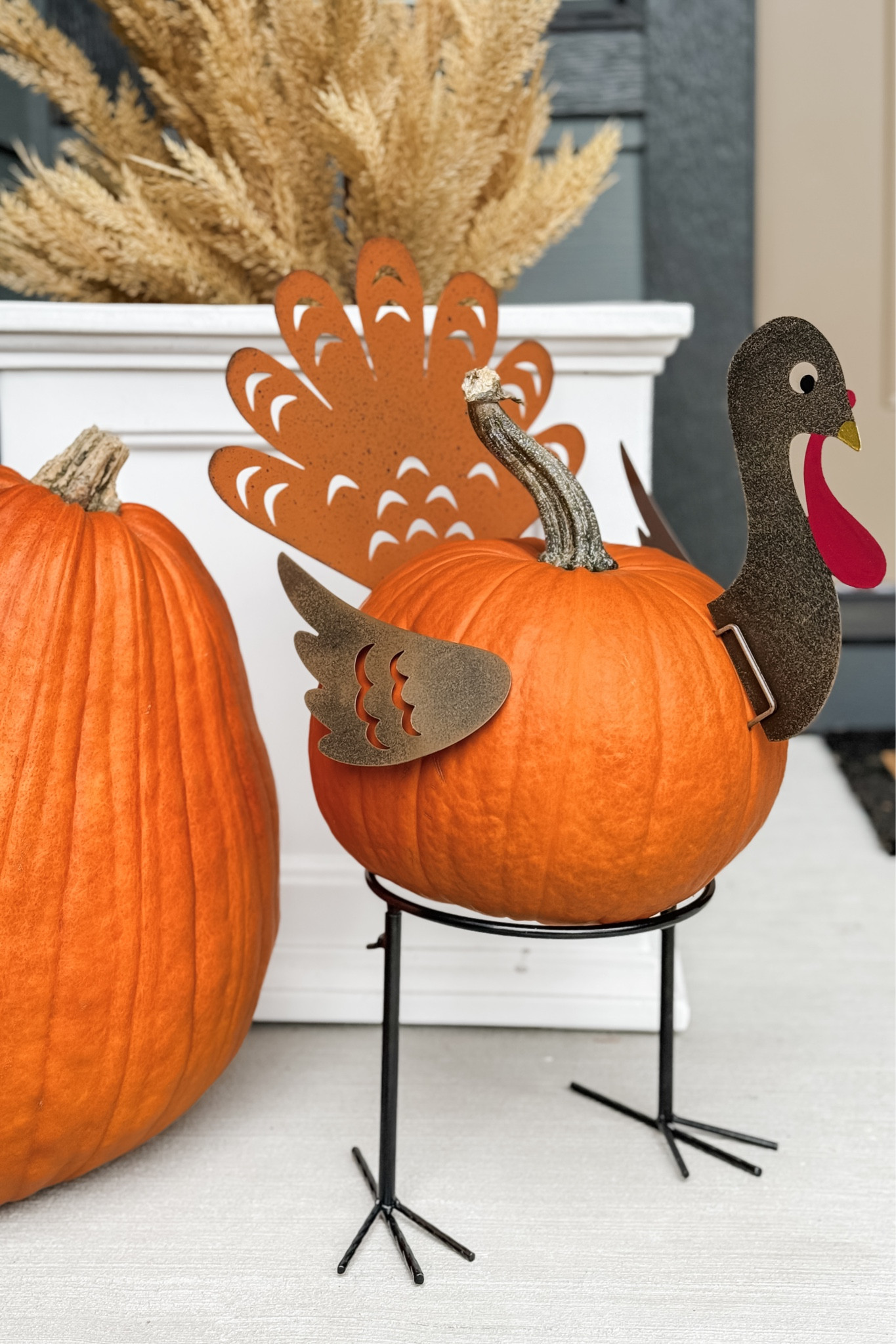 Our #LTKThanksgiving porch turkey! I loved being able to repurpose my Halloween pumpkin since we used stickers instead of carving this year. 🦃

#LTKSeasonal #LTKhome