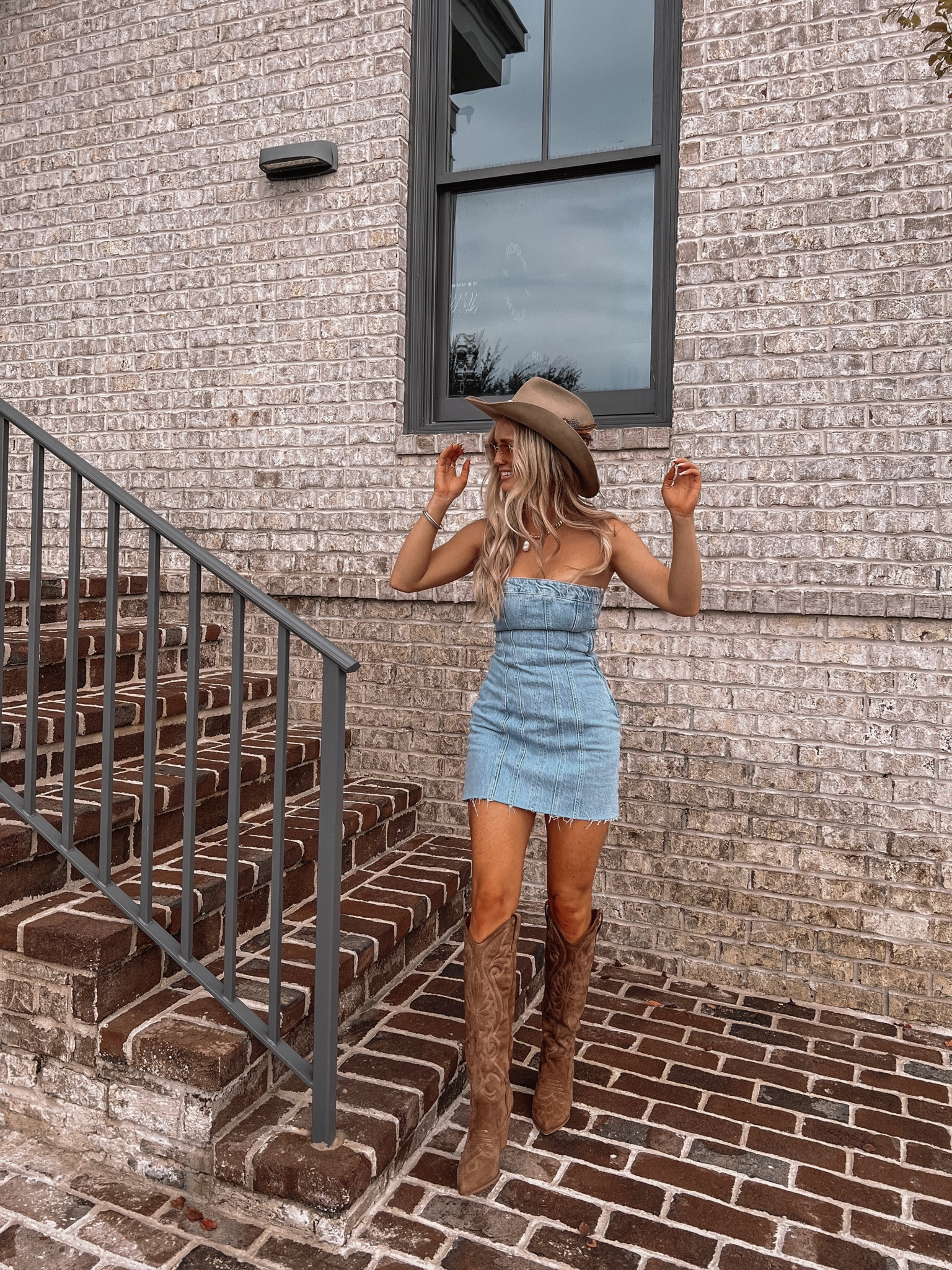Denim mini dress and brown knee high western boots for country concert 

#LTKshoecrush #LTKSeasonal #LTKtravel