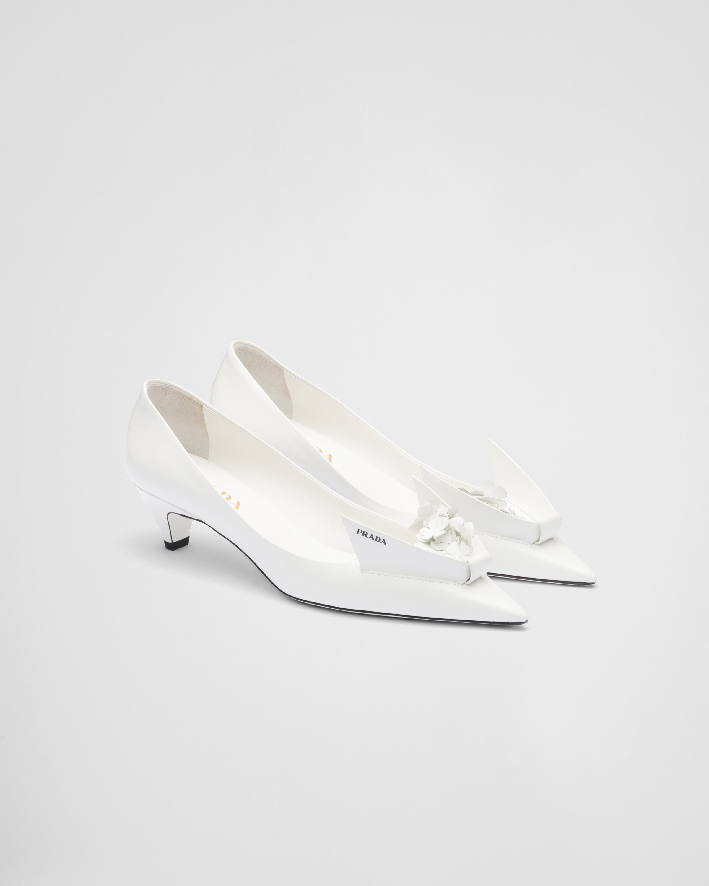 Brushed leather pumps with floral appliqués | Prada US