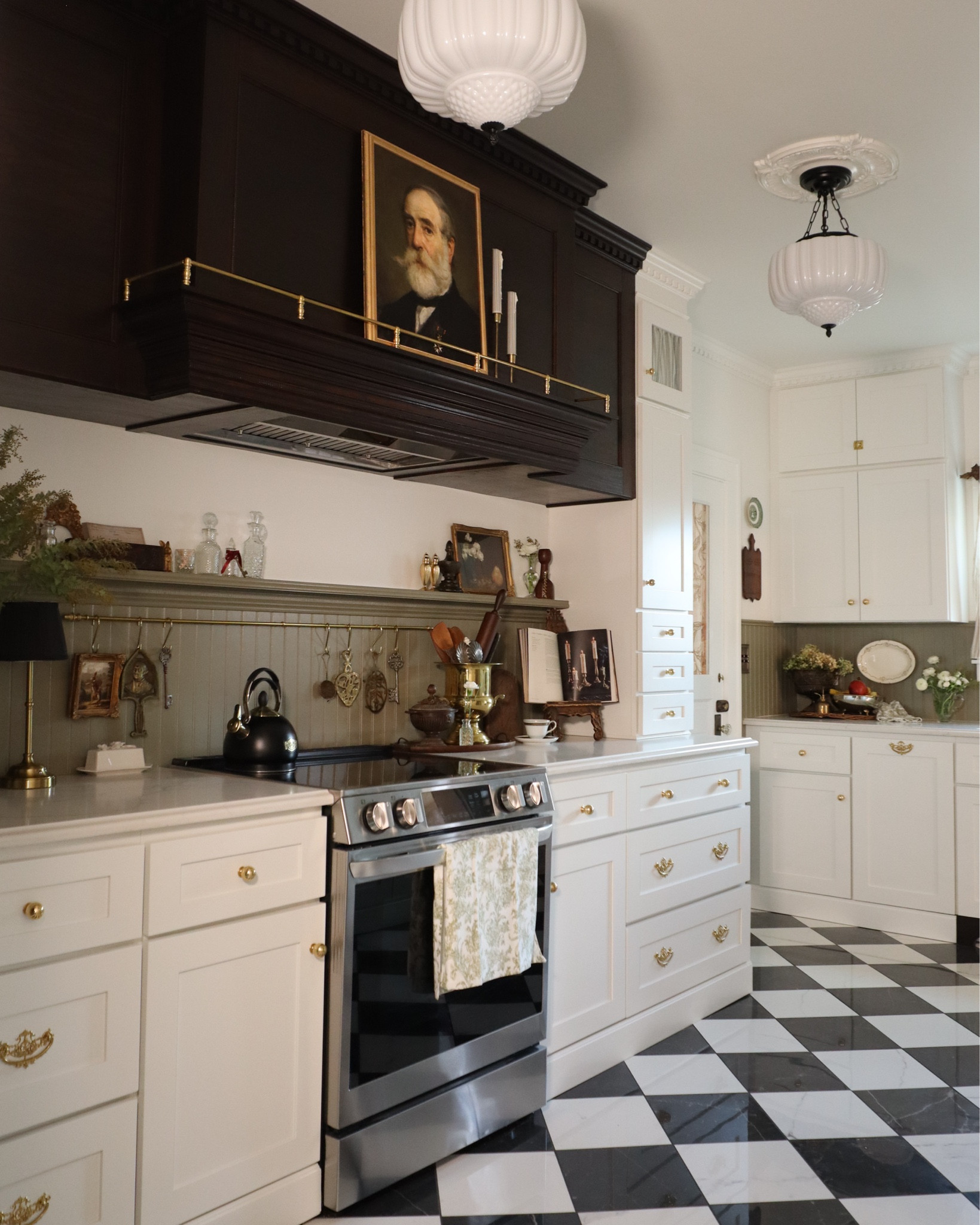 Bringing old-world charm into the kitchen with layered vintage details ✨ The portrait artwork, gallery rail, and milk glass pendant lights add a timeless, European-inspired feel, while brass accents and antique-inspired decor complete the look. Linking all my favorite classic kitchen finds, from lighting to curated vintage pieces

#LTKHome