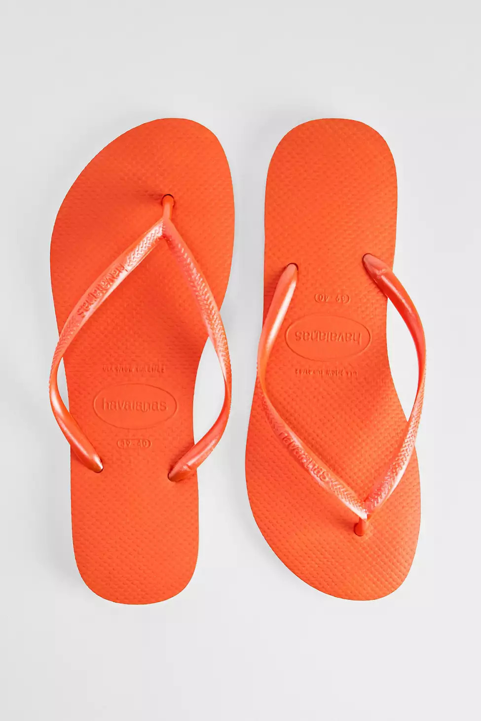 Havaianas Orange Slim Flip Flops - Orange 35/36 at Urban Outfitters | Urban Outfitters UK