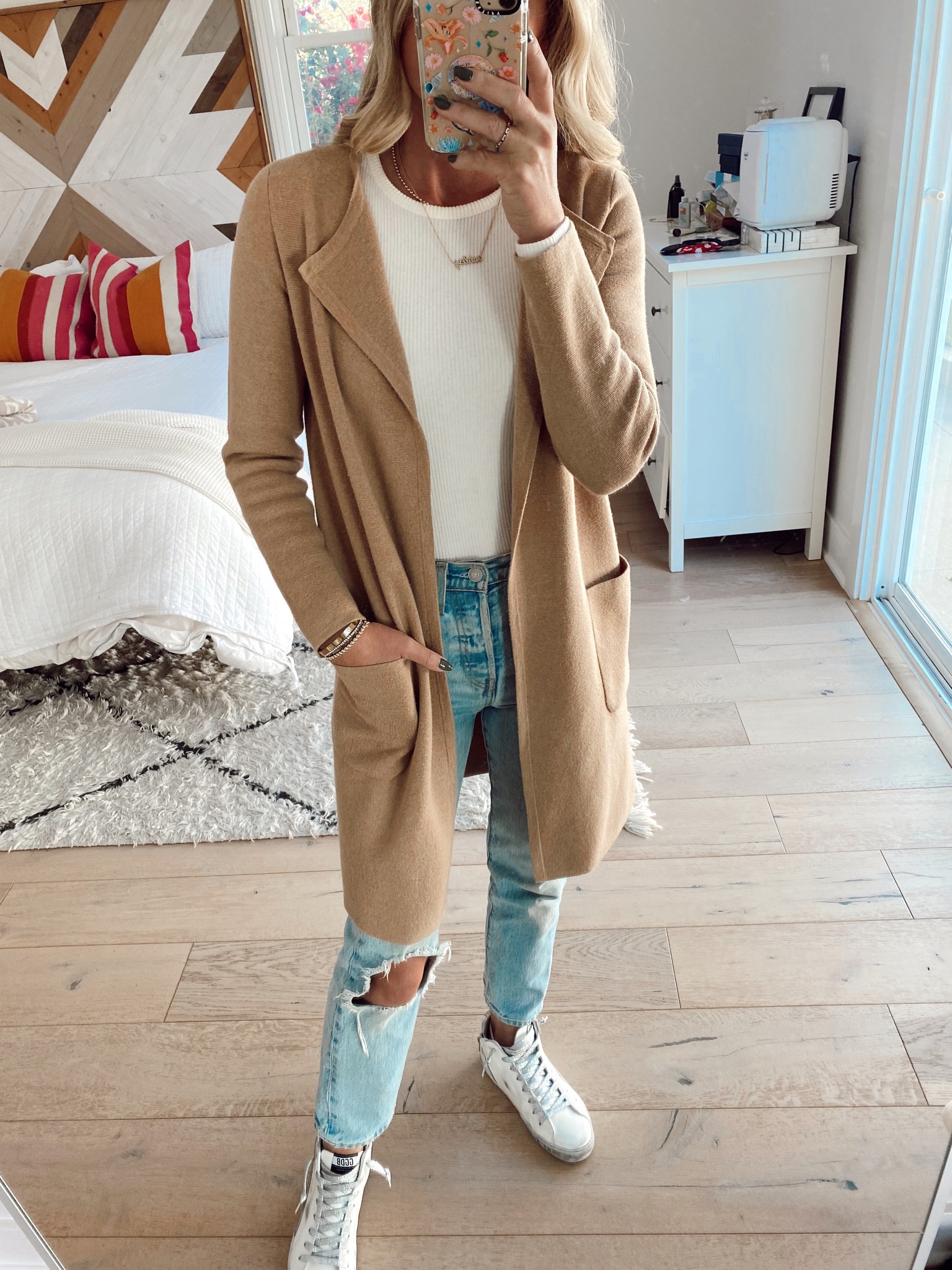 Cause fall outfit. J. Crew cardigan, Levi wedgie jeans  

#LTKunder100 #LTKSeasonal #LTKstyletip