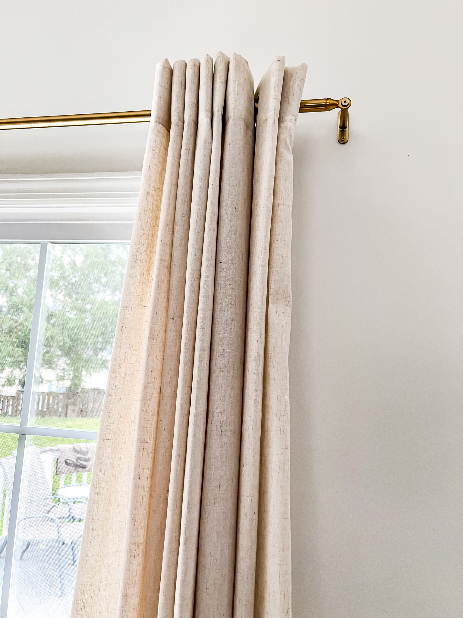 Brass curtain rod with linen curtains 

#LTKSeasonal #LTKHoliday #LTKGiftGuide