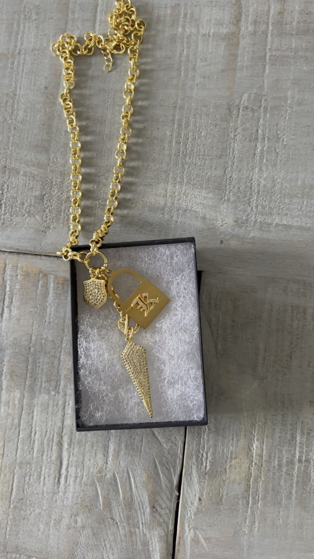 This chain necklace by Linda Mikhail Jewelry makes a statement and can be customized with your initial. 

#LTKFind #LTKunder100