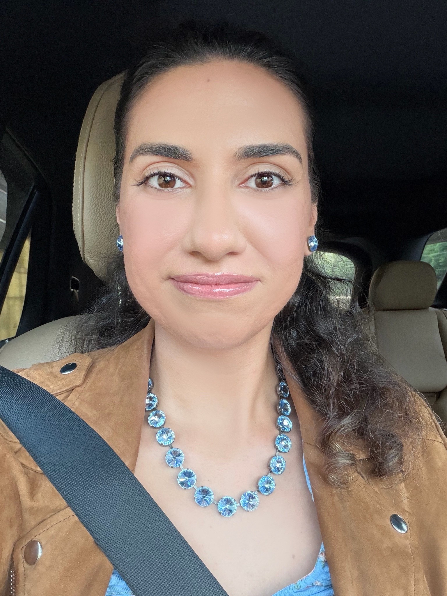 Close-up car selfie with natural, polished makeup: defined brows, soft mascara, glossy pink lips 😊💖

#LTKBeauty #LTKgrwm #LTKmorningroutine