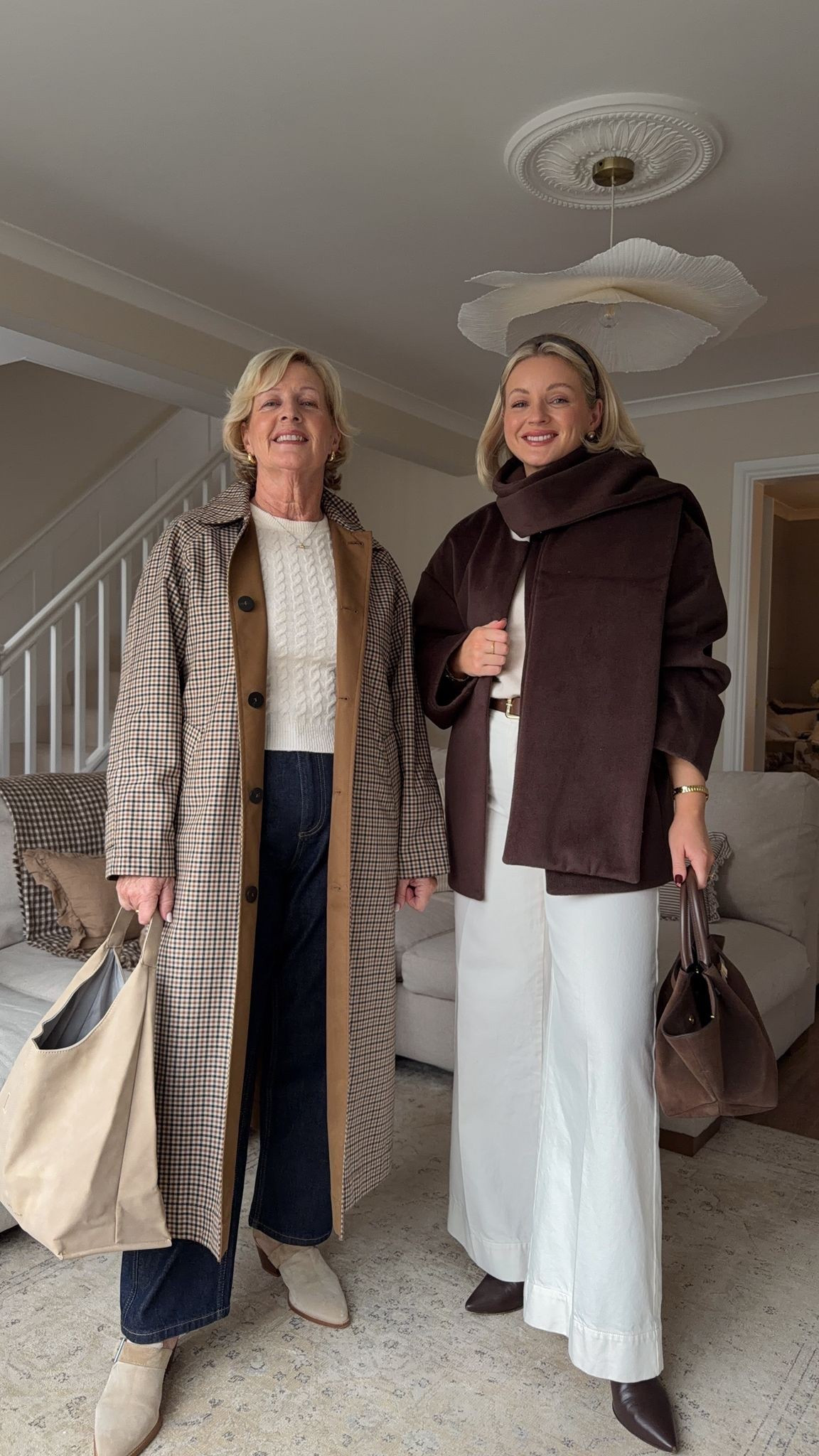 Autumn outfit ideas styled with my mum 

Me - chocolate brown scarf coat, mint velvet wide leg white trousers, Demellier mocha suede midi New York handbag & chocolate brown heeled ankle boots

Mum - Zara reversible check trench coat, H&M short sleeve cable knit cream jumper, mint velvet barrel leg jeans & beige suede boots, Katie Liston beige tote bag  #LTKautumn 

#LTKuk #LTKstyletip