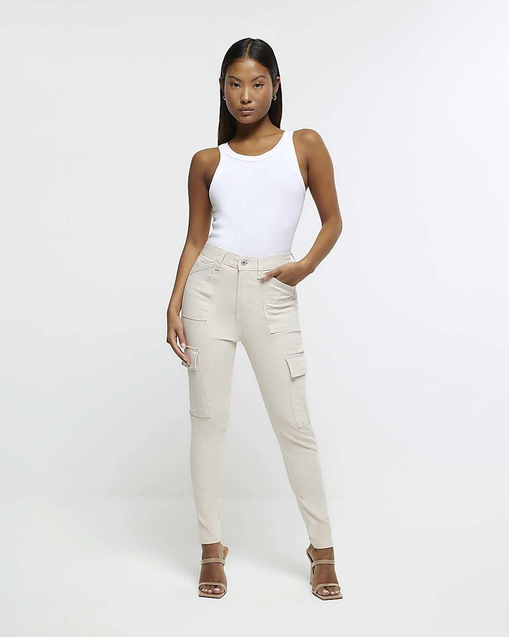 Petite beige high waisted skinny cargo jeans | River Island (UK & IE)