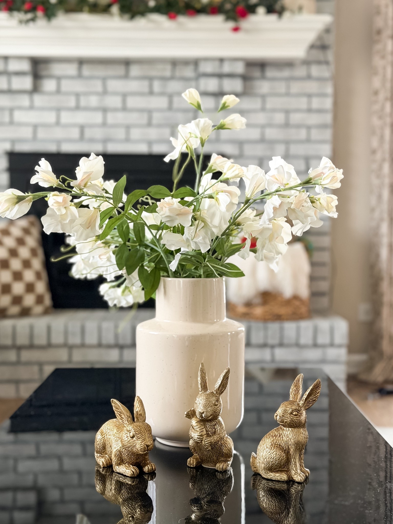 Simple Spring decor! Easter bunnies, coffee table decor, flowers and vase. 

#LTKSaleAlert #LTKHome #LTKOver40