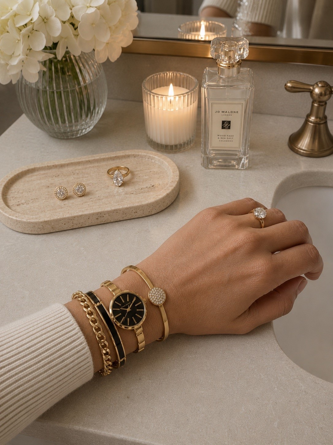 Anne Klein Watch + Bracelet Set on Major Sale ✨

This Anne Klein bangle watch and bracelet set looks so much more expensive than it is… and right now it’s 72% off 👀 The gold + black details are timeless, elevated, and perfect for everyday wear or dressing up. Love it styled with this beautiful neutral travertine tray for a simple, luxe vanity moment. Such a good Mother’s Day gift idea too 🤍

Only $42 for the full 4-piece set.

Follow @farmtotablecreations on Instagram for more home finds and styling ideas

#anneklein #watchset #goldjewelry #amazonfinds #vanitydecor

anne klein watch | bracelet stack | gold jewelry | vanity styling | jewelry tray | travertine tray | amazon jewelry | mothers day gift | bracelet set | watch band | neutral decor | bathroom vanity | affordable jewelry | gold watch | jewelry styling | amazon fashion | classy style | feminine decor | luxury for less | everyday jewelry | black and gold | home styling | gift ideas | amazon deals | vanity accessories

#LTKMothersDay #LTKselfcare #LTKSaleAlert