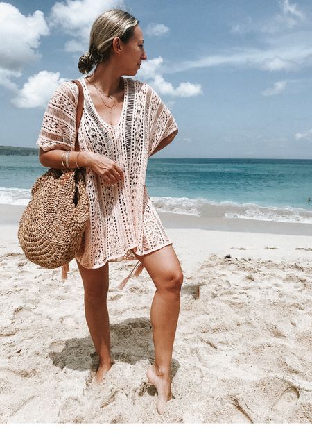 Amazon beach cover up comes in lots of colors super comfortable and cute beach bag is also Amazon fits everything and has a zipper great for the beach or vacation. And resort spring break 

#LTKswim #LTKtravel