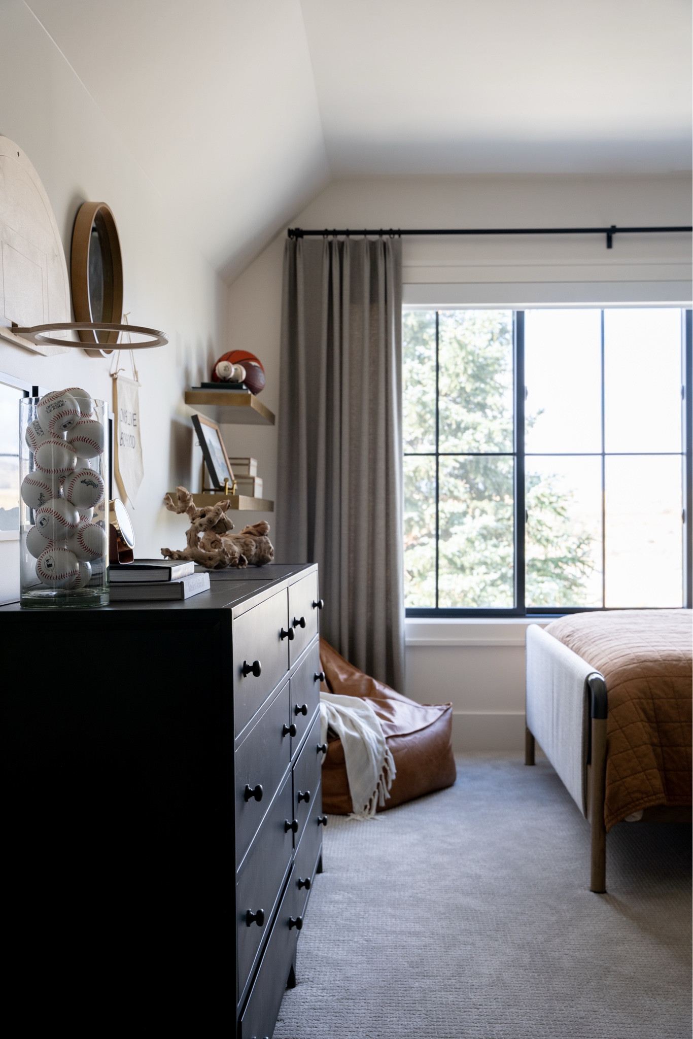 This kid's room is a perfect blend of comfort and creativity, designed to spark imagination and joy. As Christmas approaches, there's nothing like the laughter and excitement of kids, filling the space with extra warmth and holiday magic. 

#Holiday #boy #Christmas #decor #kids #kidroom #basketball #leather #boyroom 

#LTKHome #LTKSeasonal #LTKFamily