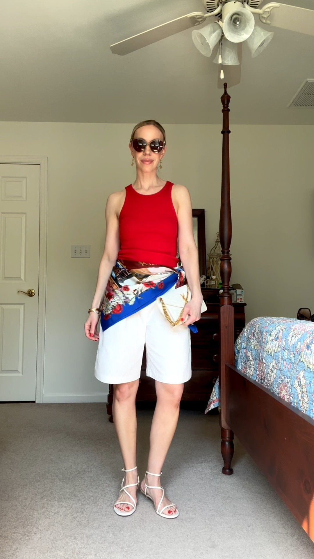 Red tank top with white linen bermuda shorts and silk scarf tied at the waist - a chic look for vacation dinner or date night

#LTKTravel #LTKOver40 #LTKgrwm