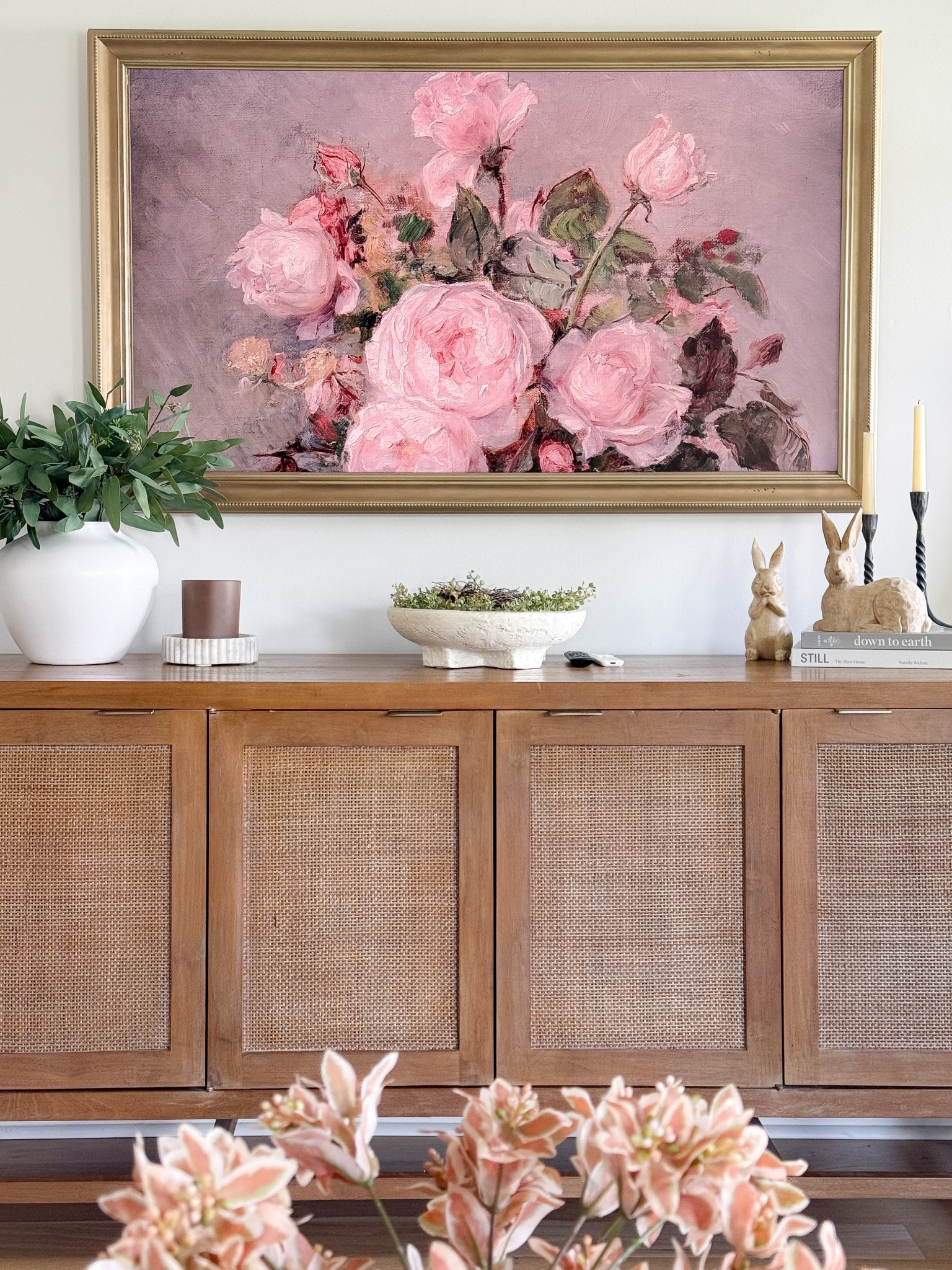 Spring tv console sideboard styling, adding this gold bezel to my frame tv made it look more like art.

#LTKStyleTip #LTKHome #LTKSeasonal